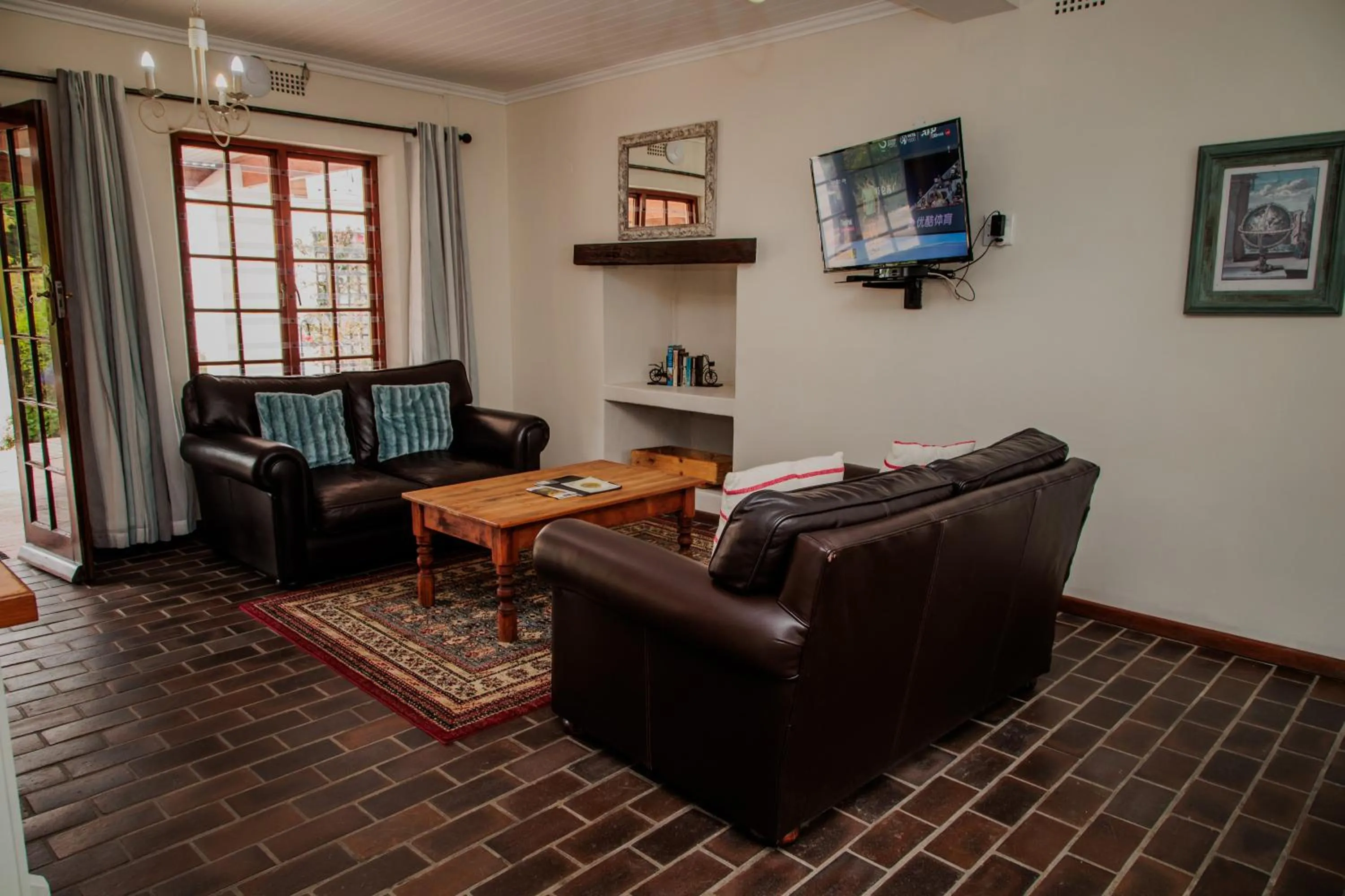 TV and multimedia in Aan de Oever Guesthouse