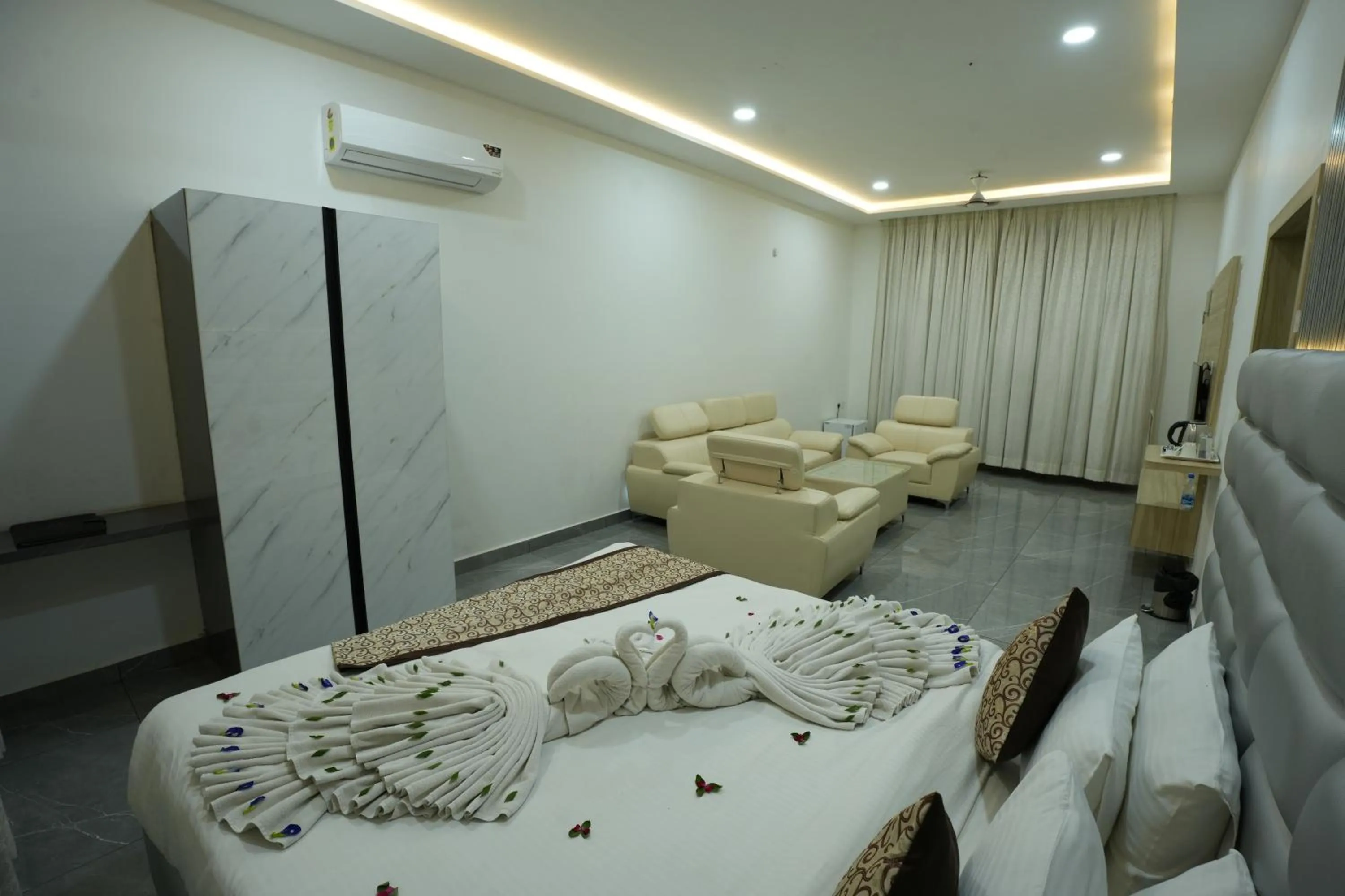 Bed in Tripura Resort