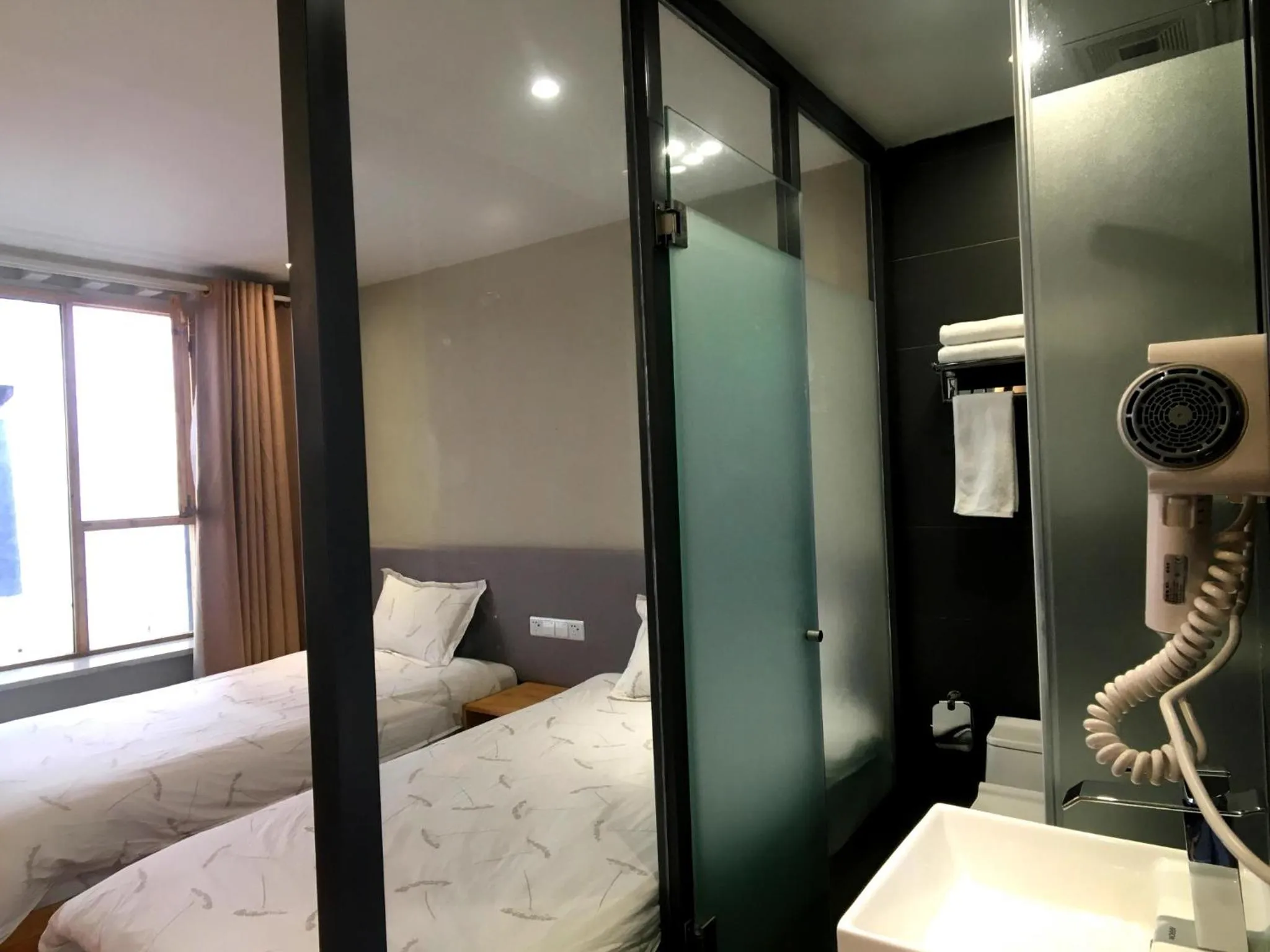 Decorative detail, Bed in Fengma Feiyang Hostel