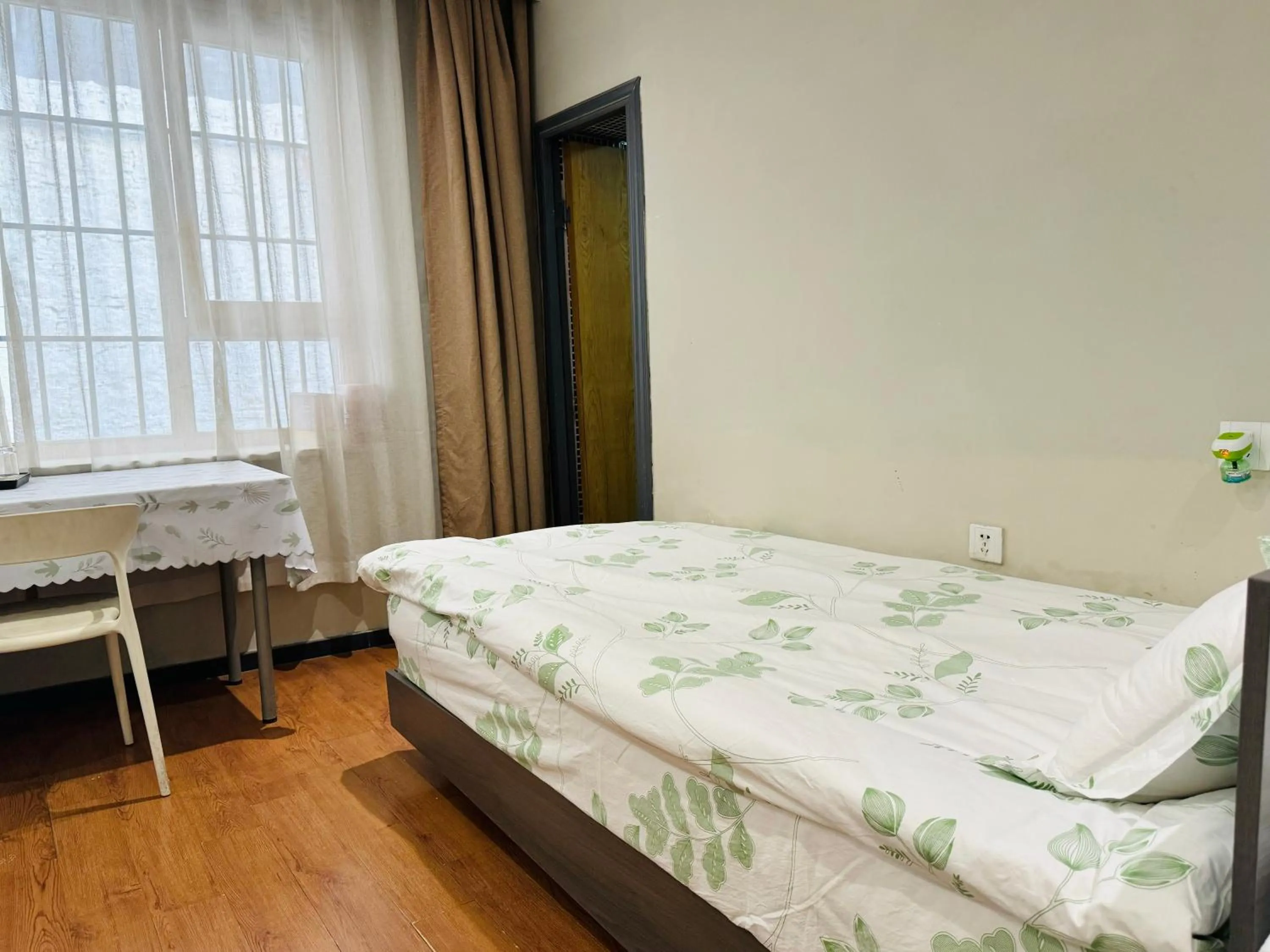 Bed in Fengma Feiyang Hostel