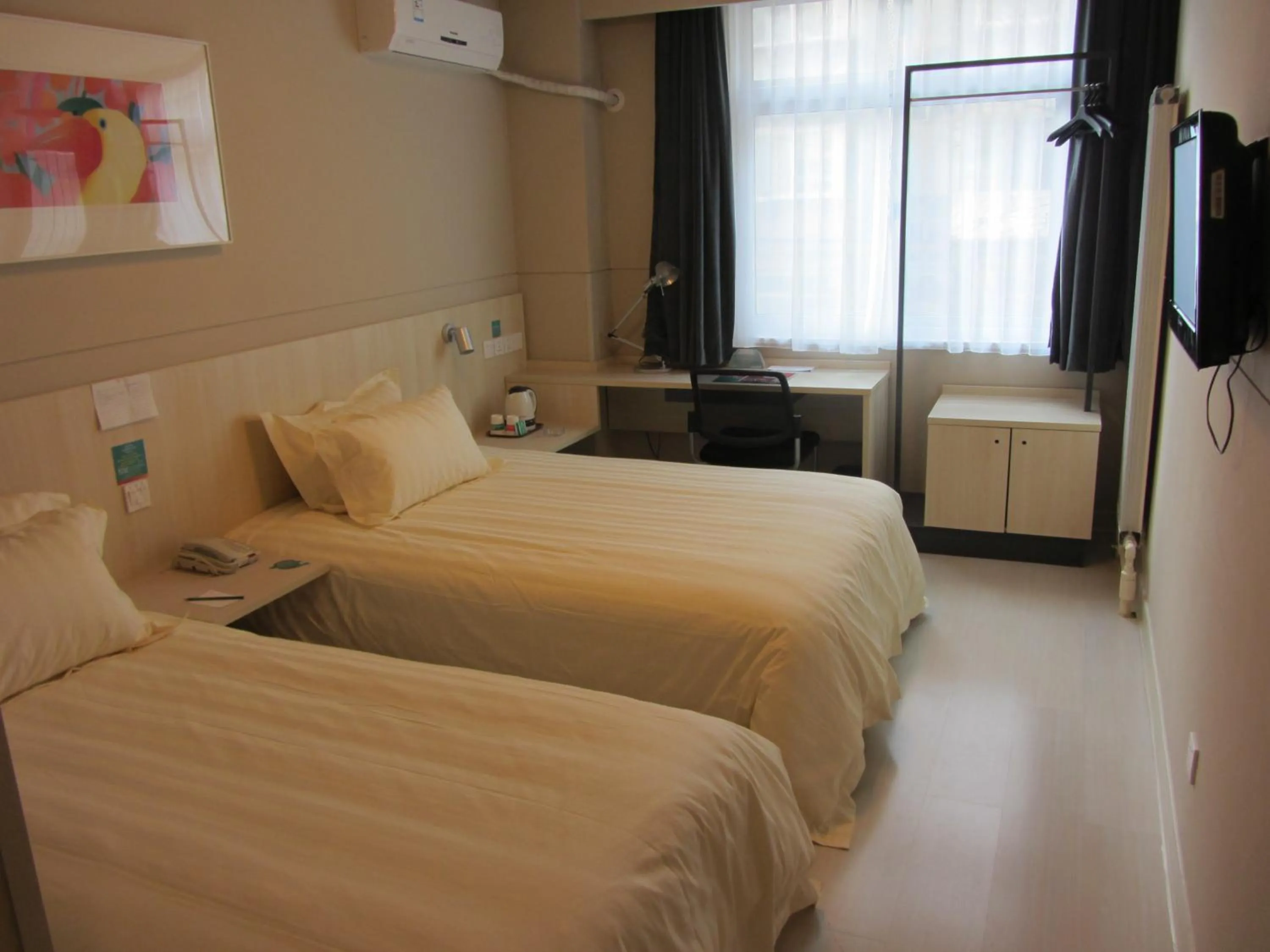 Bed in Jinjiang Inn Jining Yanzhou Century Silver Plaza