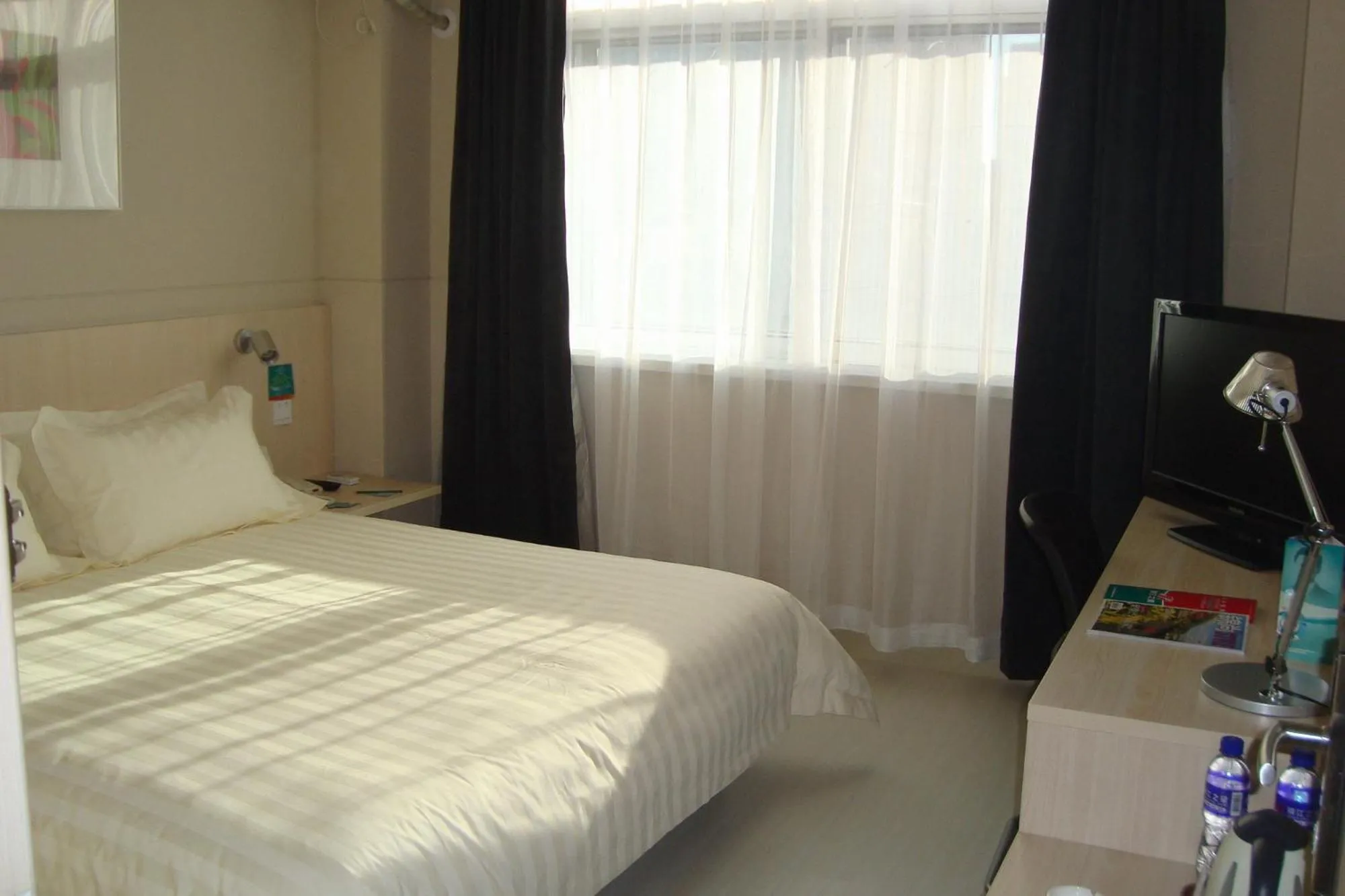 Bed in Jinjiang Inn Wanda Plaza Hotel Taiyuan Street Shenyang