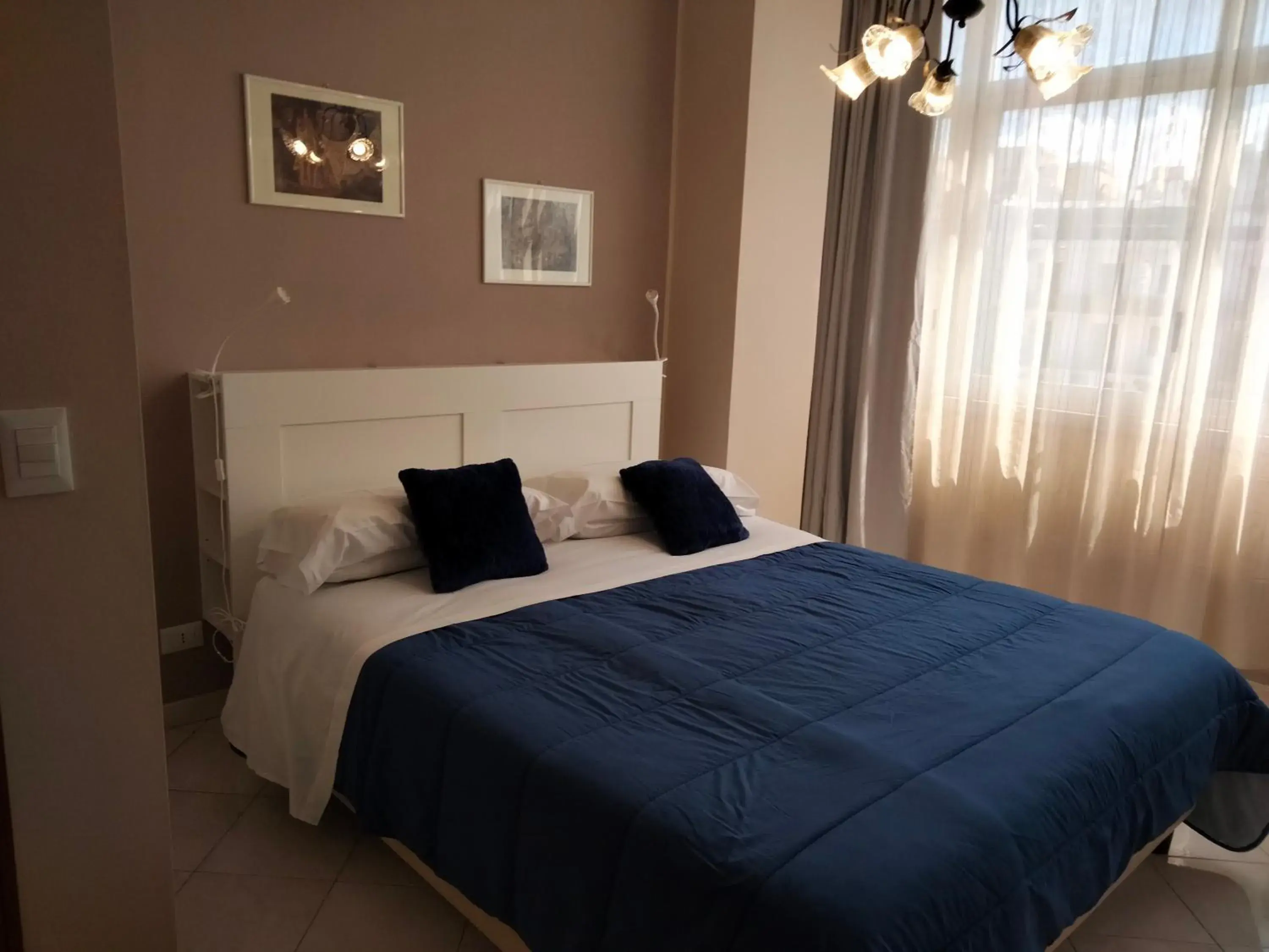 Deluxe Triple Room in B&b Bagheria Deluxe Triple Room in B&b Bagheria