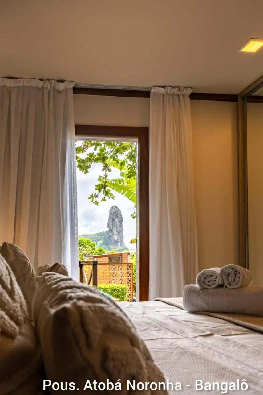 Bed in Pousada Atoba