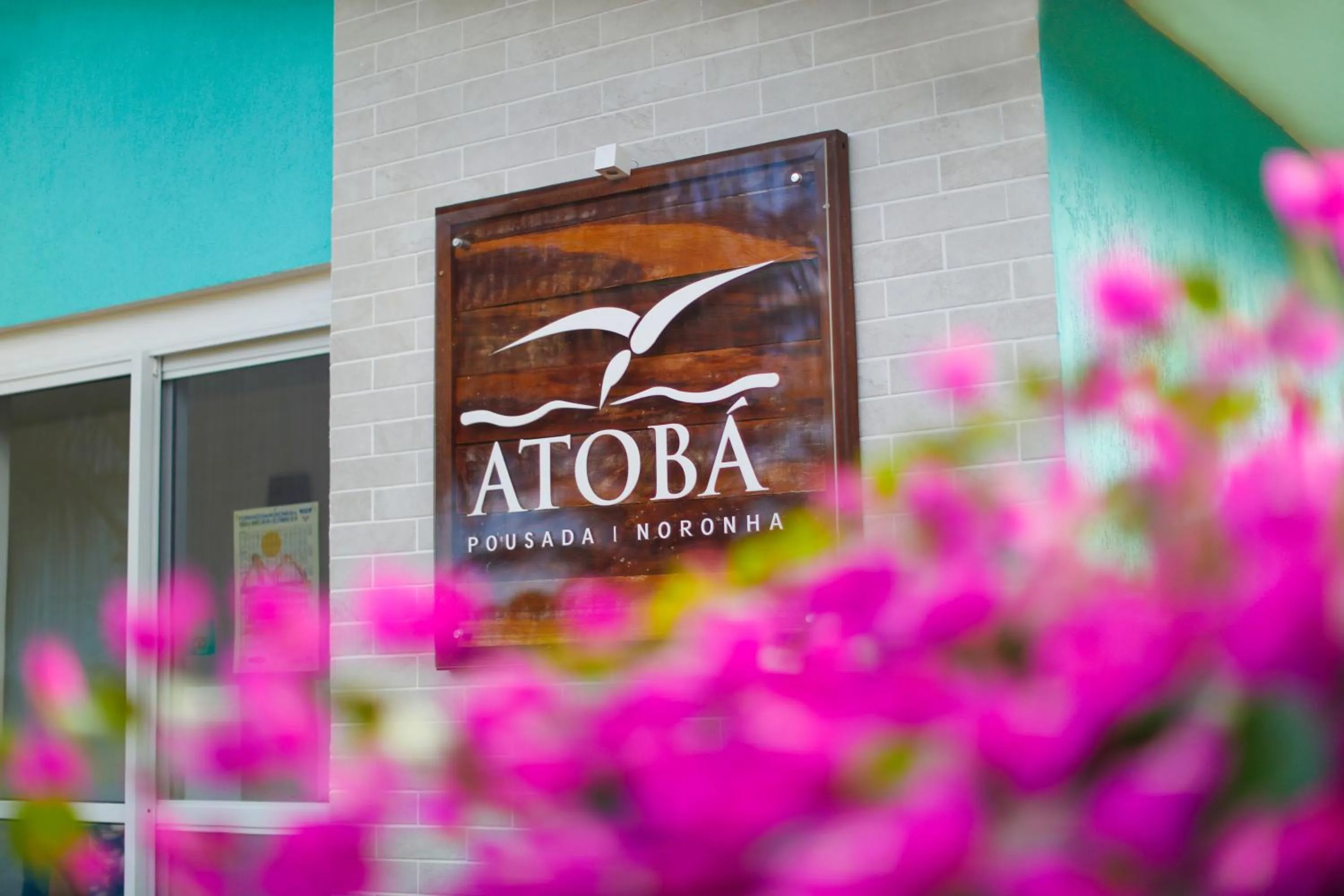 Property logo or sign in Pousada Atoba