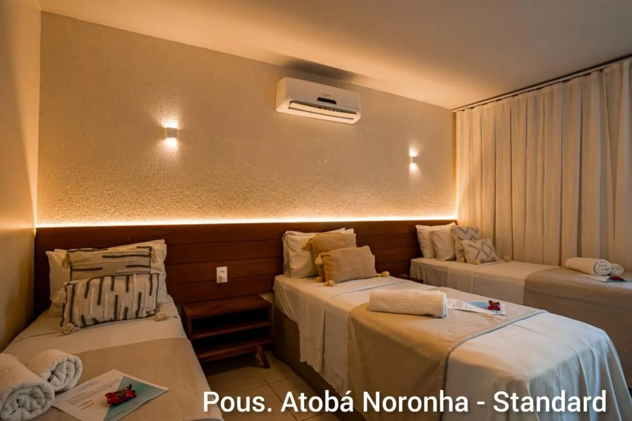 Bed in Pousada Atoba