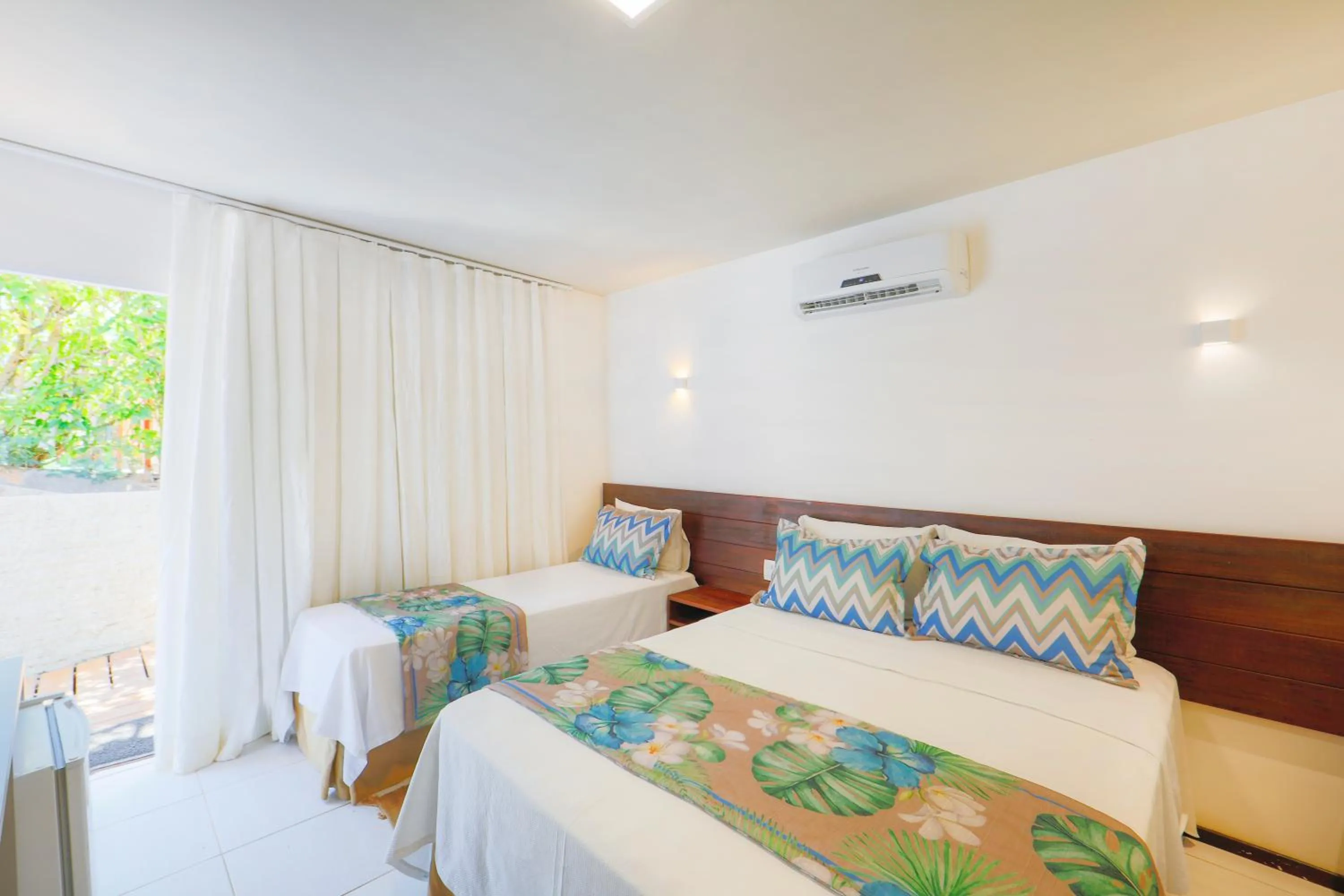 Bed in Pousada Atoba