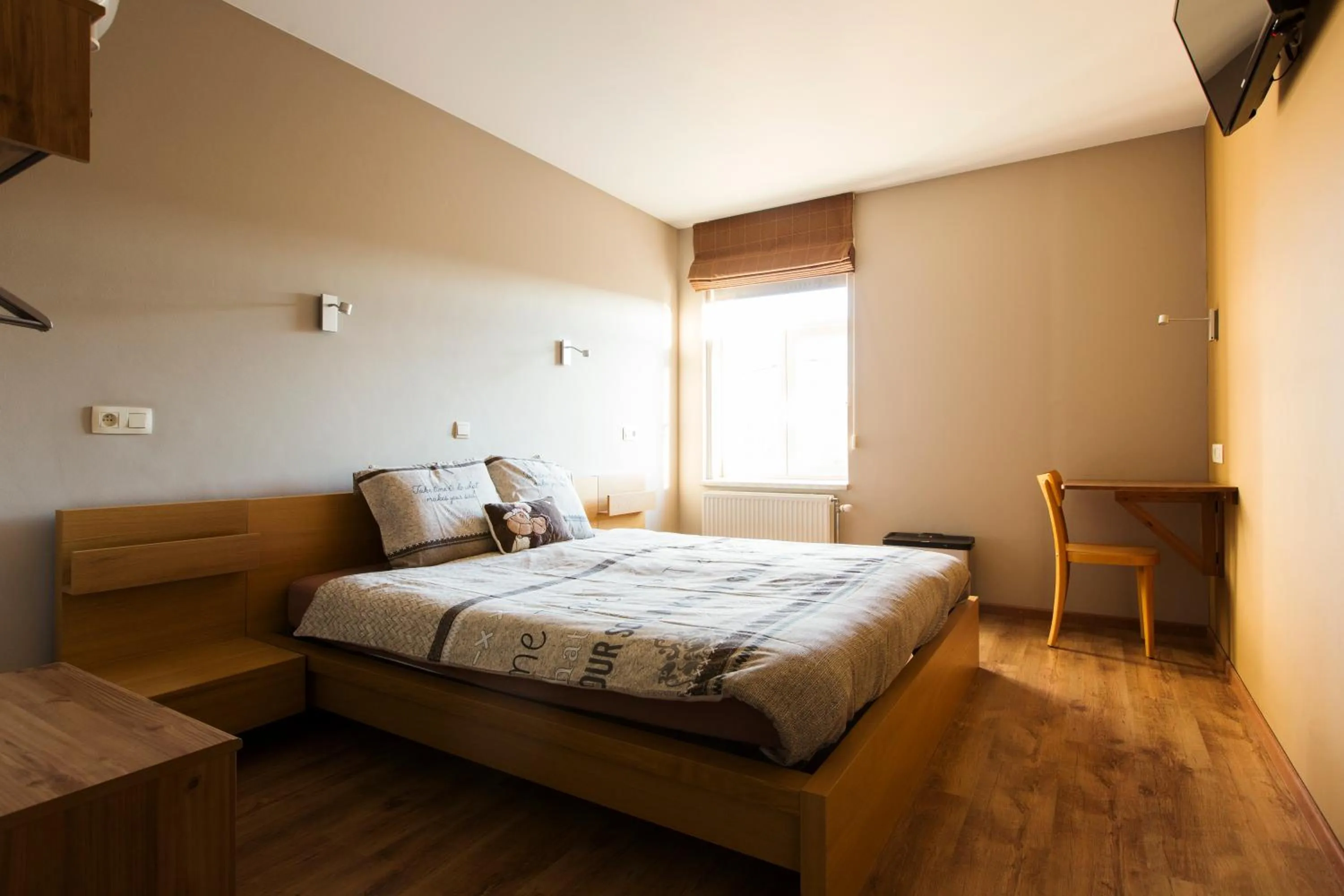 Bed in Hoevehotel Ronse