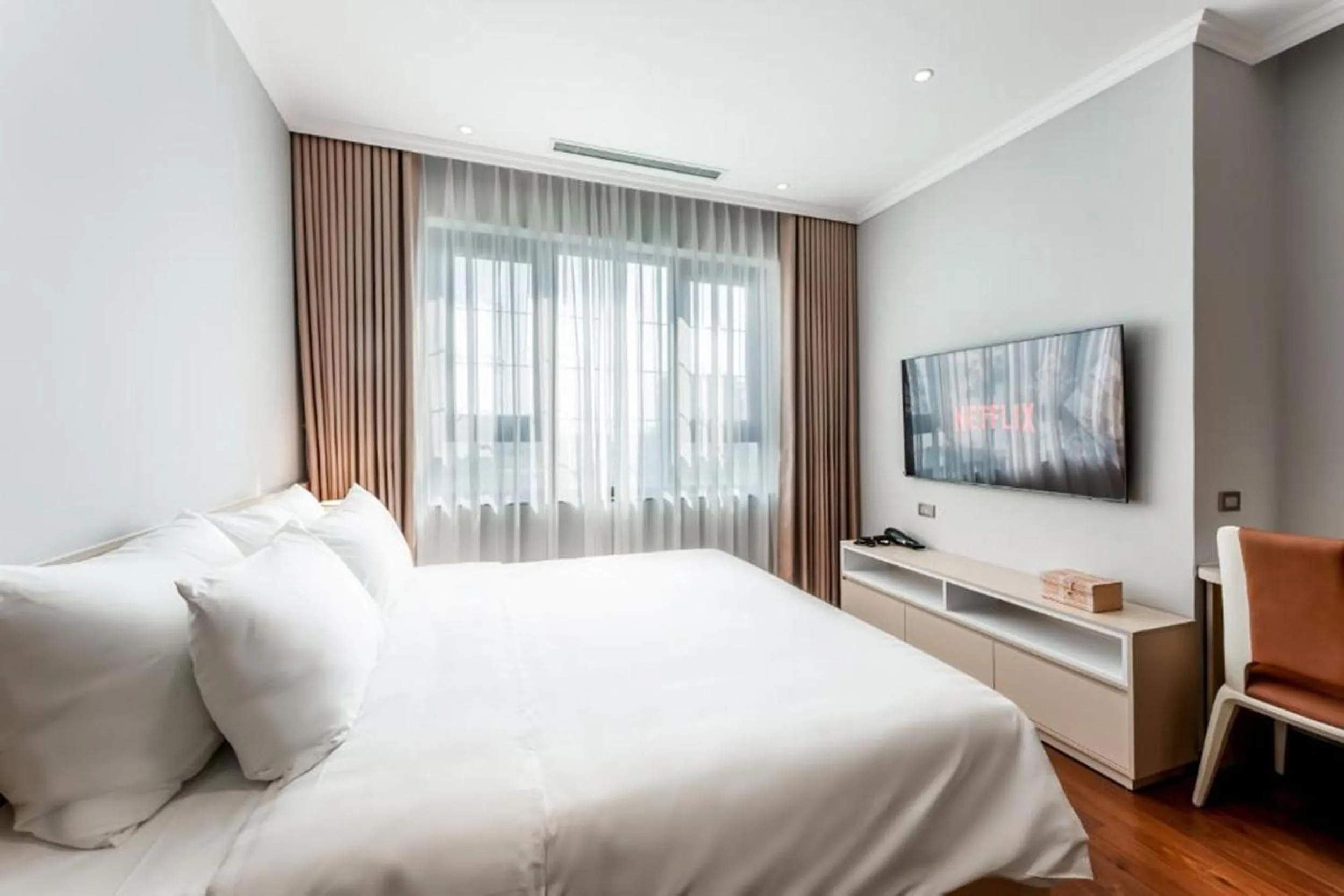 Bed in Luxe Paradise Suites Tay Ho