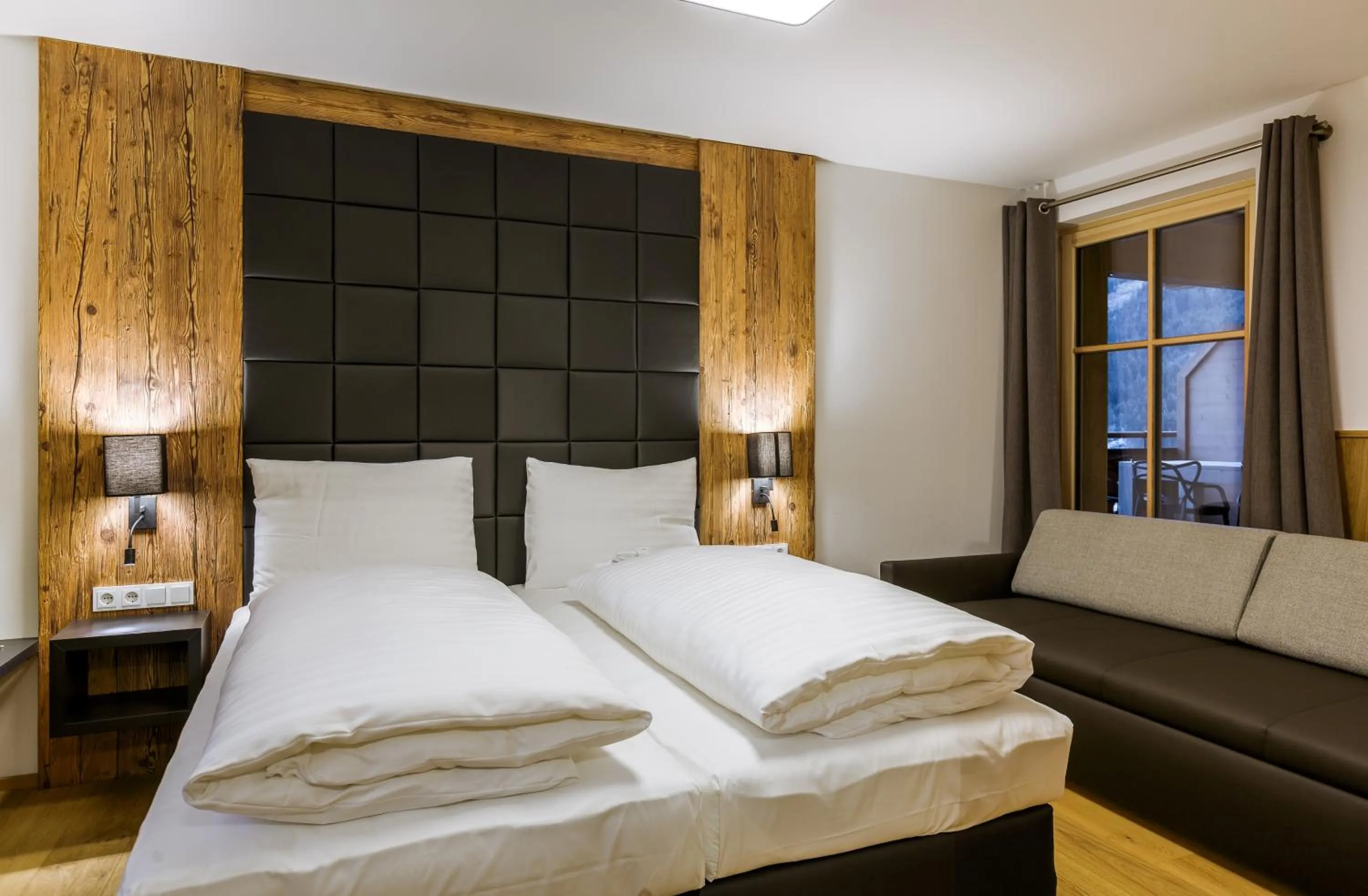 Bedroom, Bed in Bolodges Apartments by Alpin Rentals