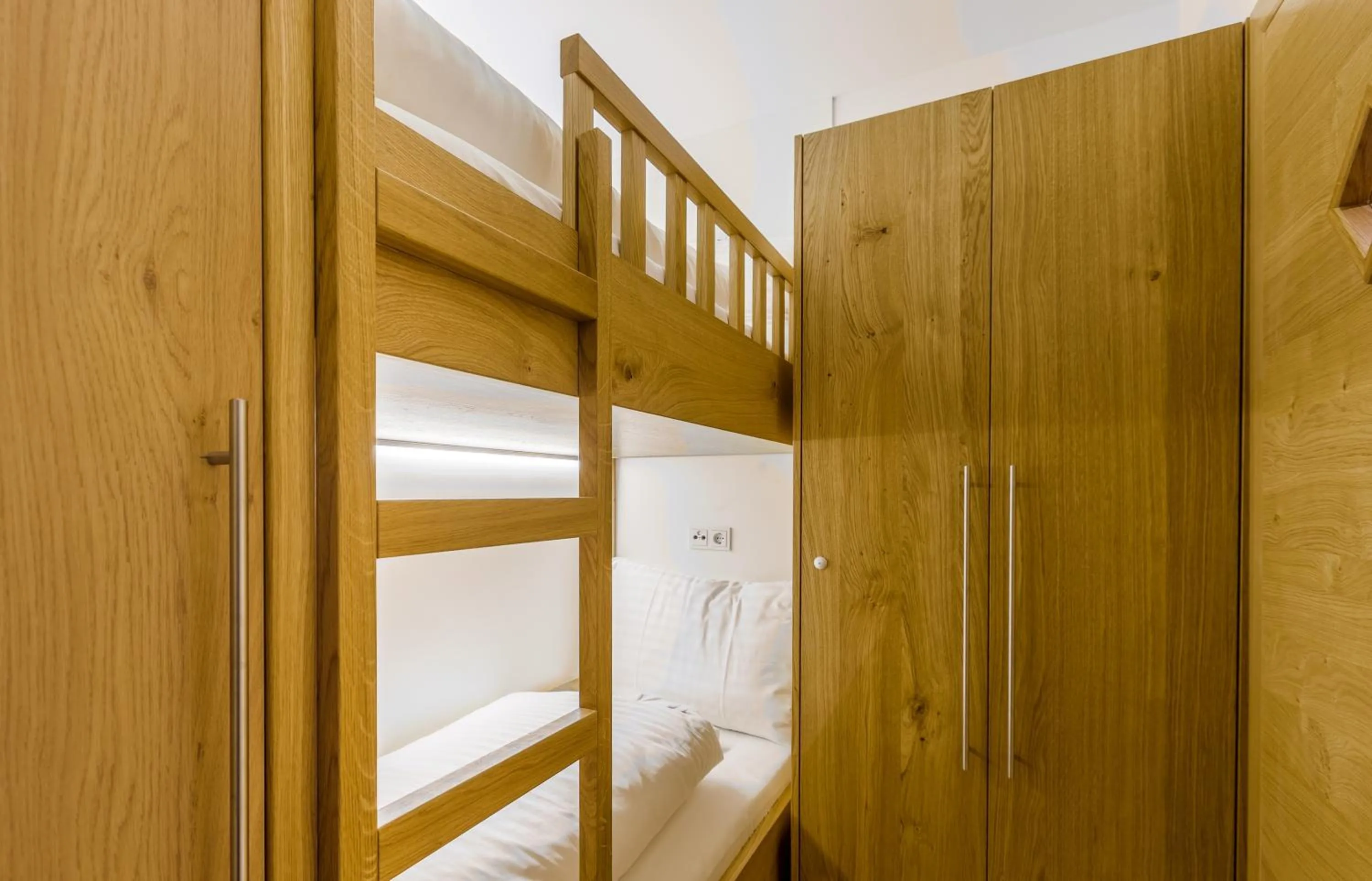 Bedroom, Bed in Bolodges Apartments by Alpin Rentals