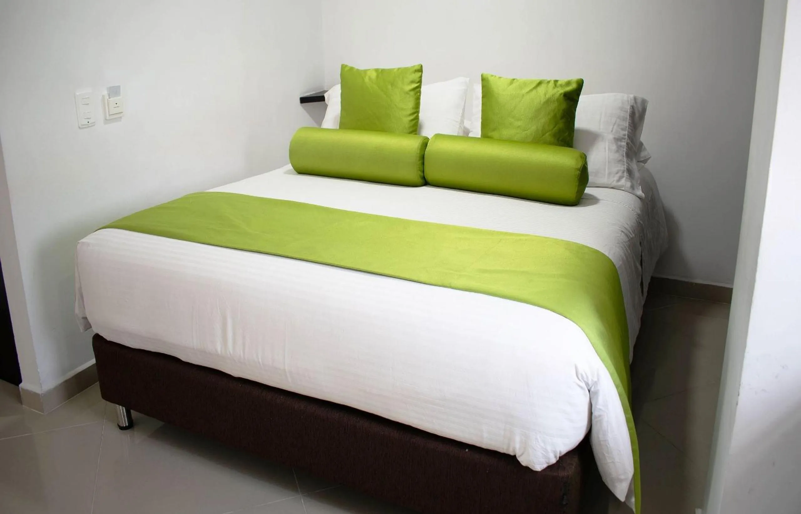 Bed in Hotel Piaro In Suites