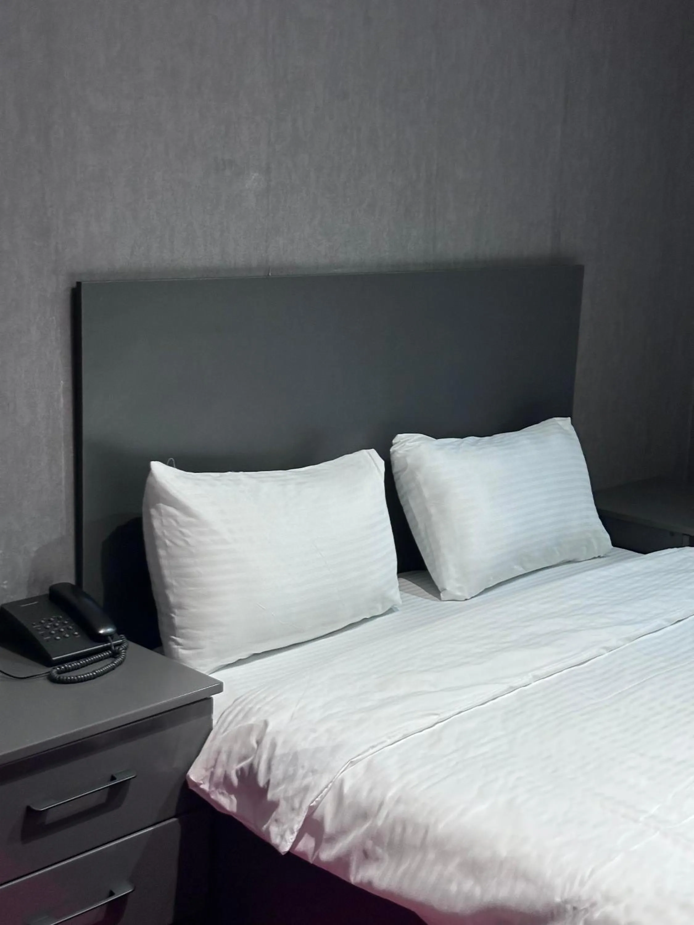 Bed in Central City Hotel