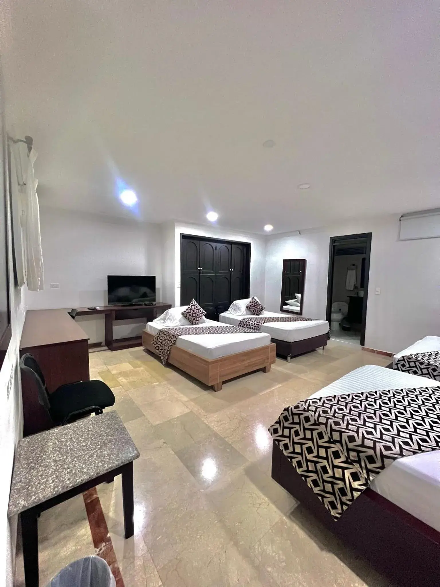 Classic Quadruple Room - single occupancy in Hotel Ingenio Reina Isabel Classic Quadruple Room - single occupancy in Hotel Ingenio Reina Isabel