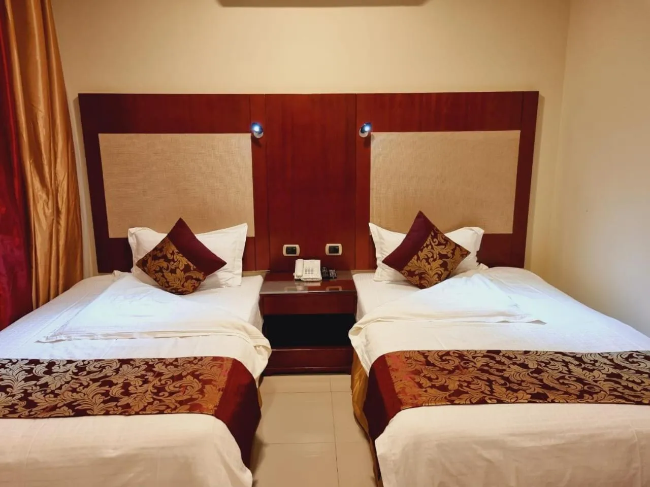 Bed in رؤوم ان للشقق الفندقية-Raoum Inn Hotel Apartments