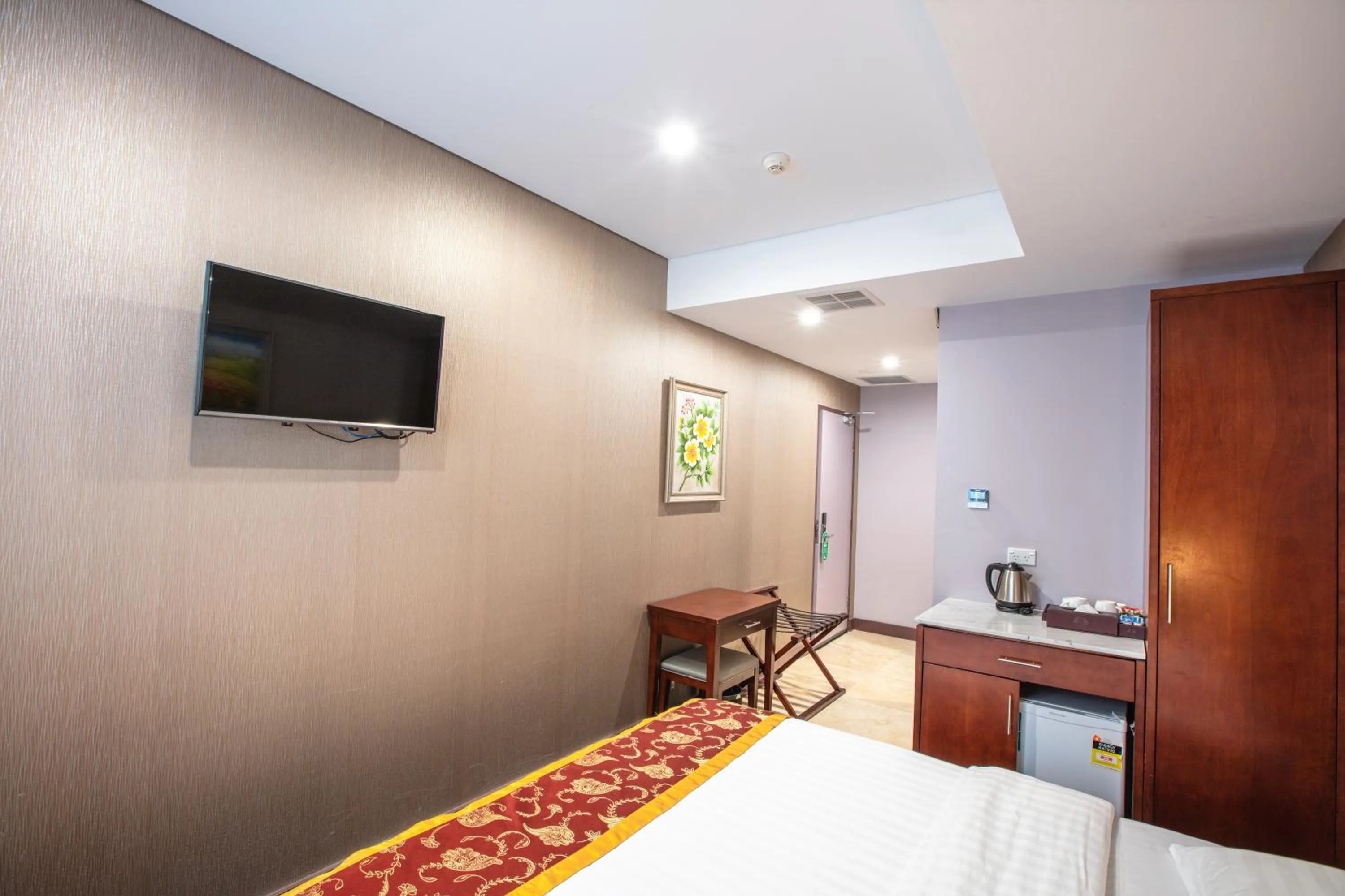 Bed in Megaboom City Hotel