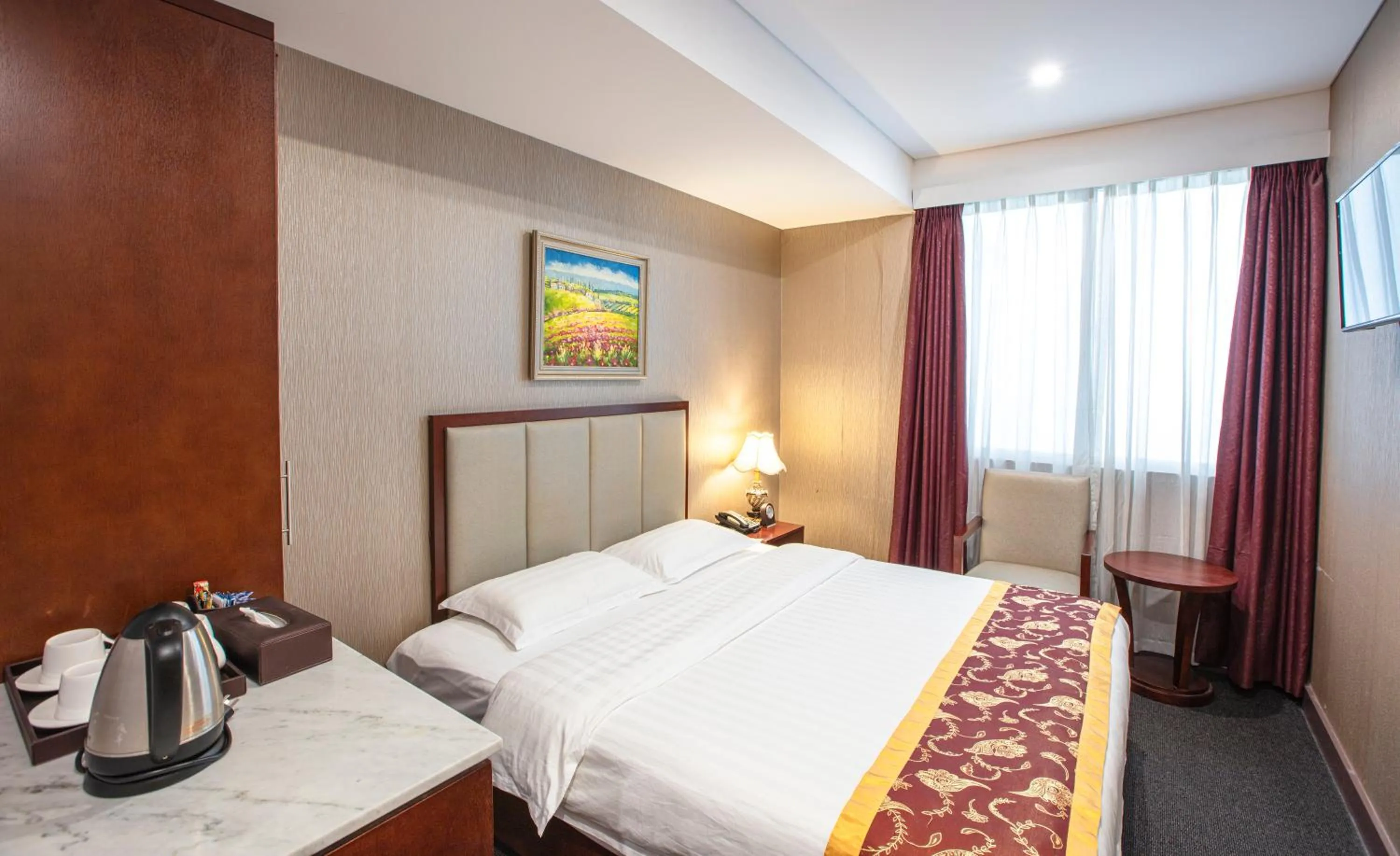 Bed in Megaboom City Hotel