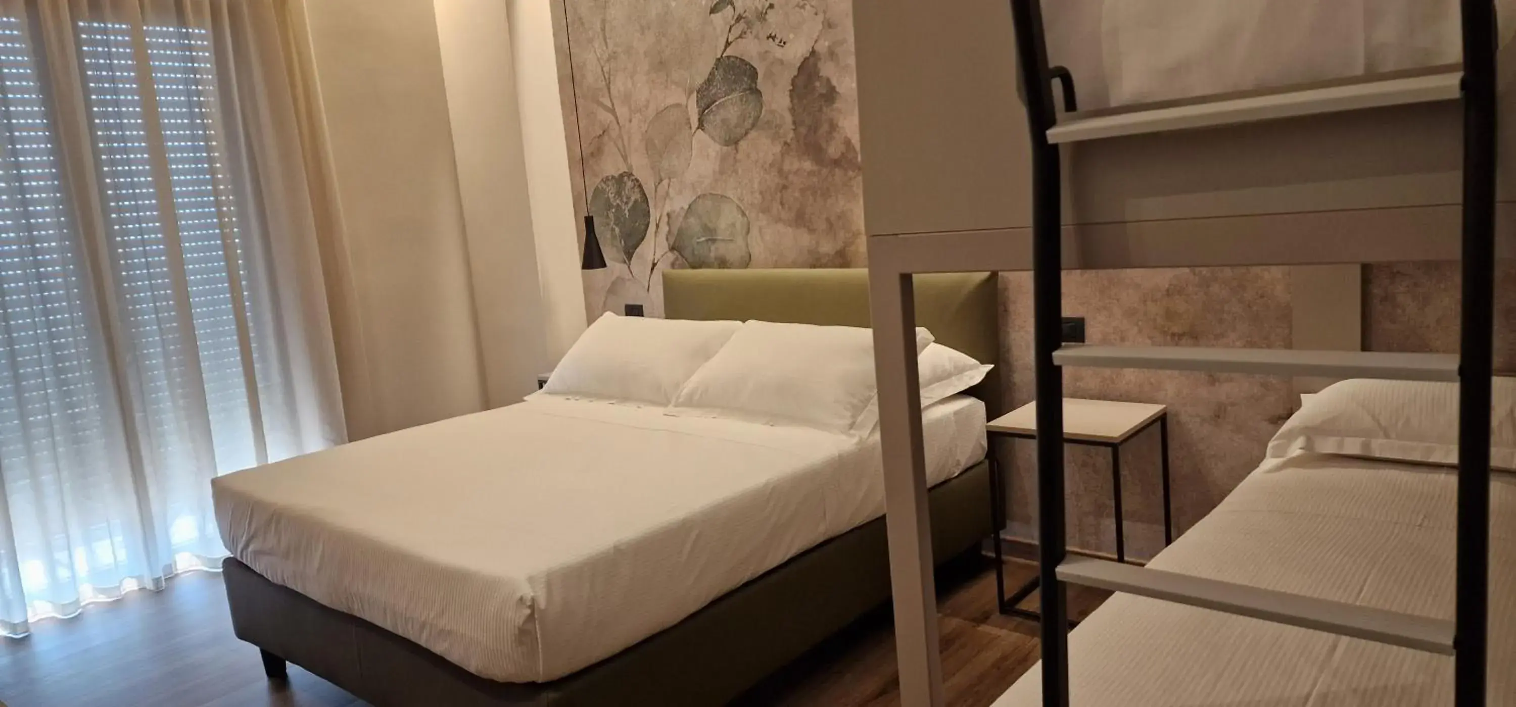 Classic Quadruple Room in Hotel La Rocca Classic Quadruple Room in Hotel La Rocca