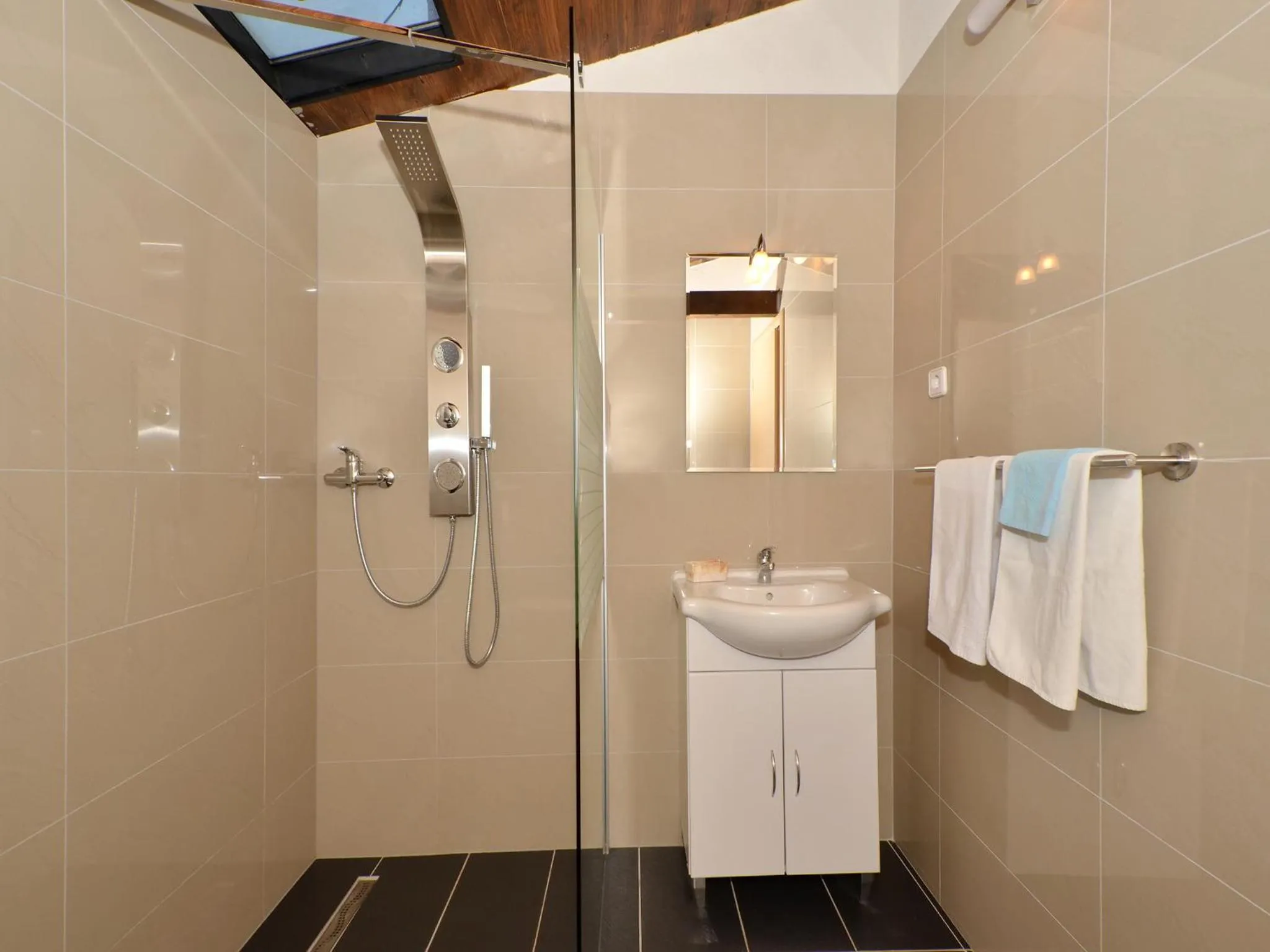 Bathroom in Apartments Silva with a view of sea