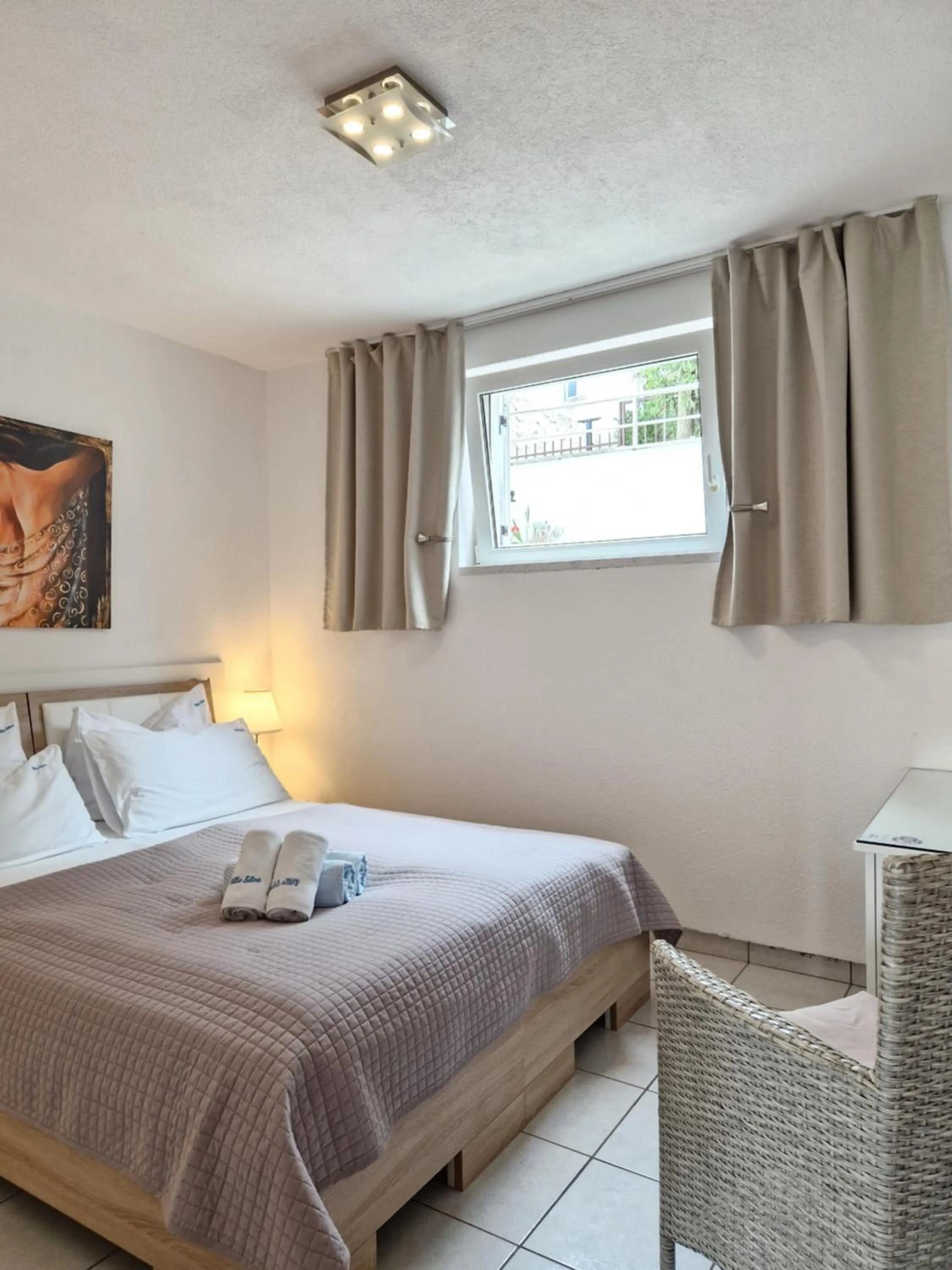 Bed in Apartments Silva with a view of sea