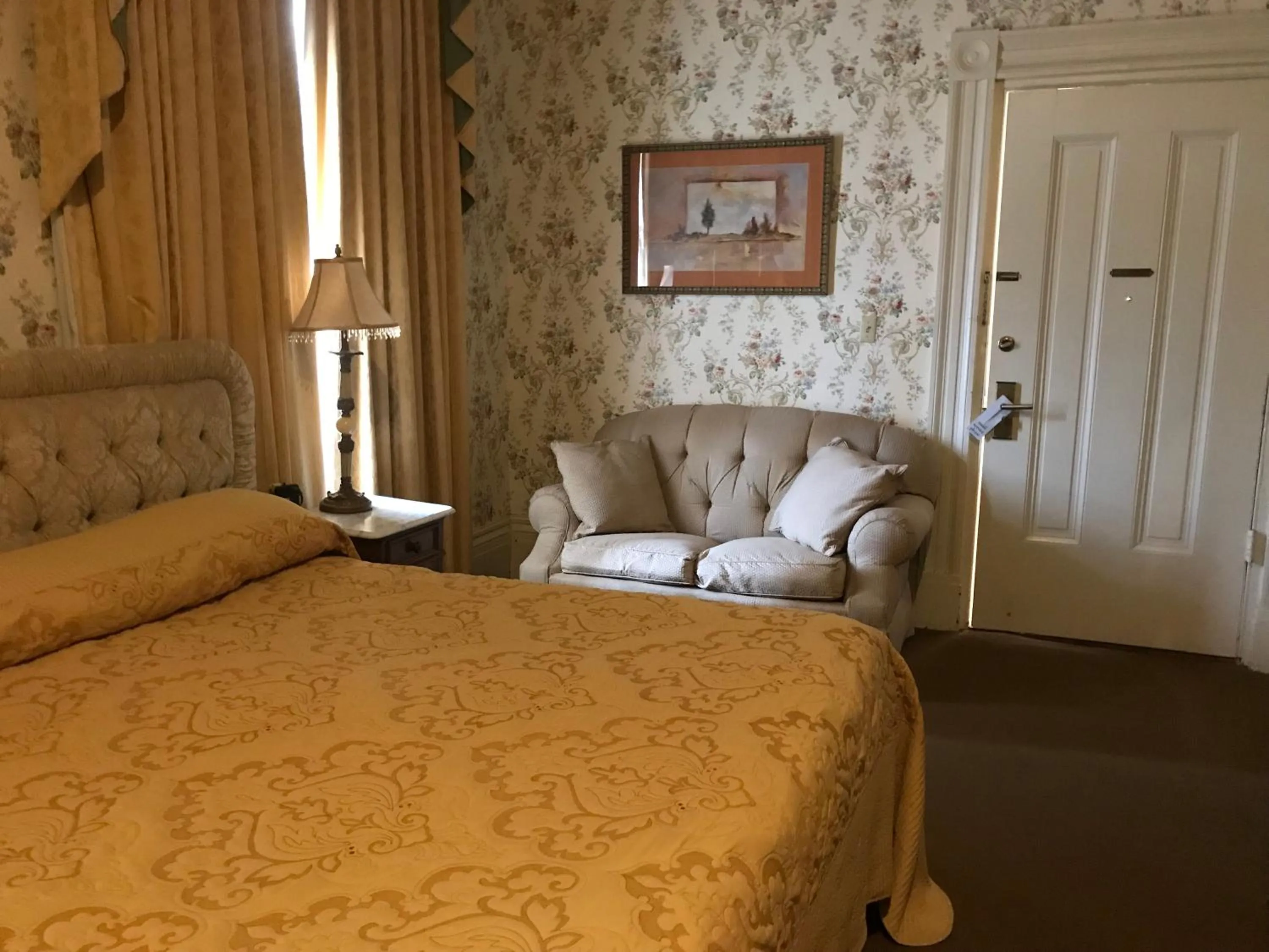 Bed in The Guest House Historic Mansion
