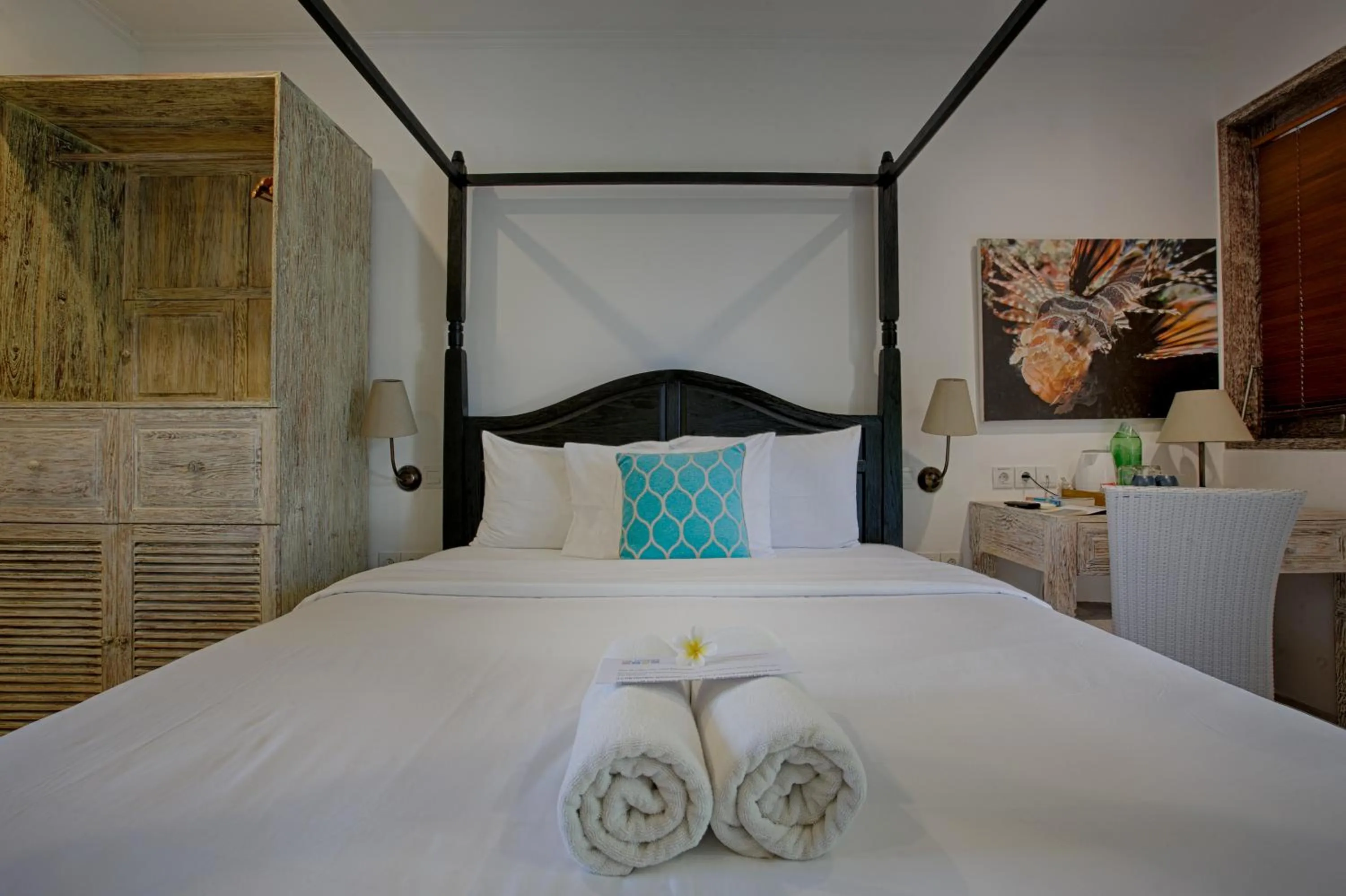 Bed in OK Divers Resort & Spa