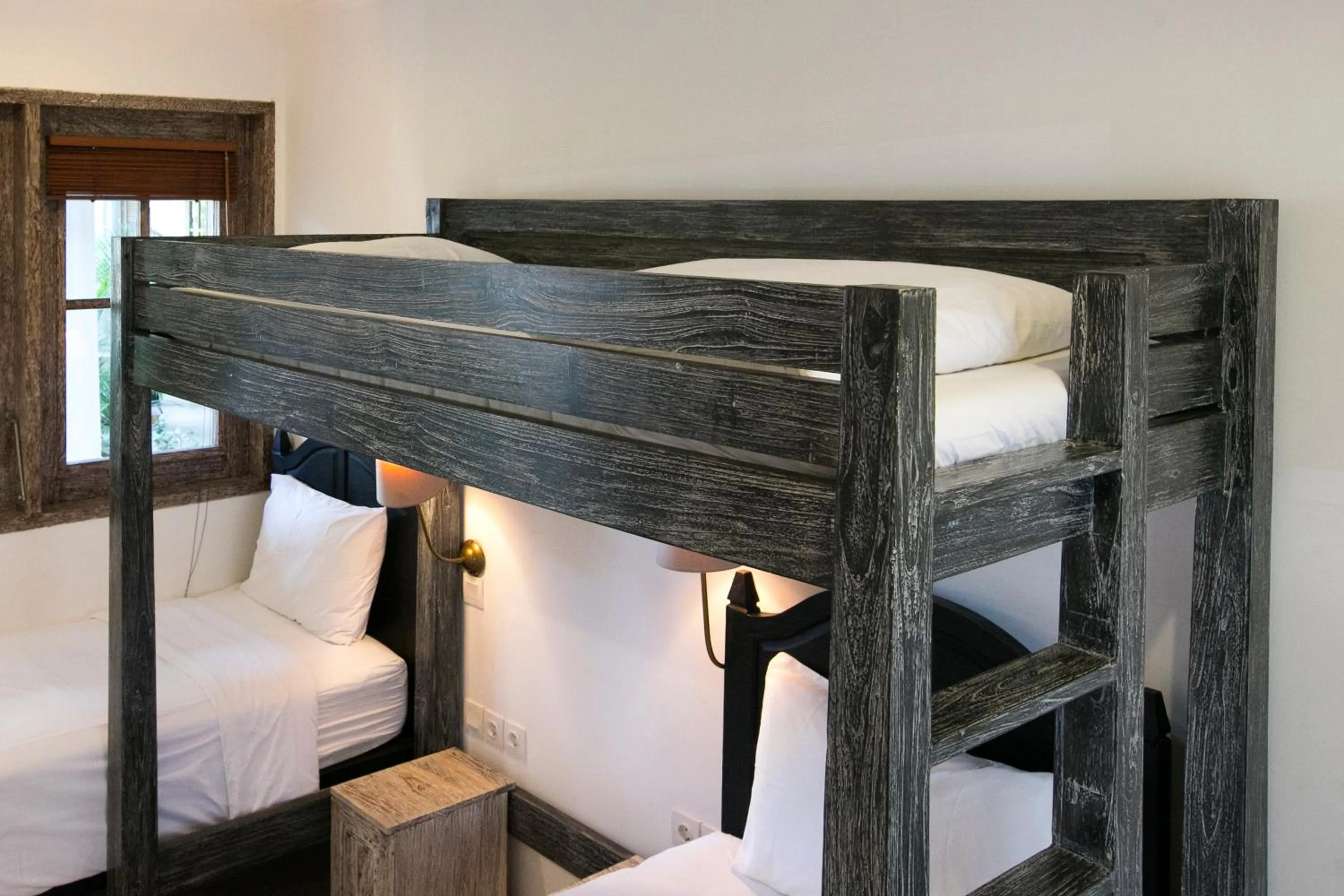 Bed in OK Divers Resort & Spa