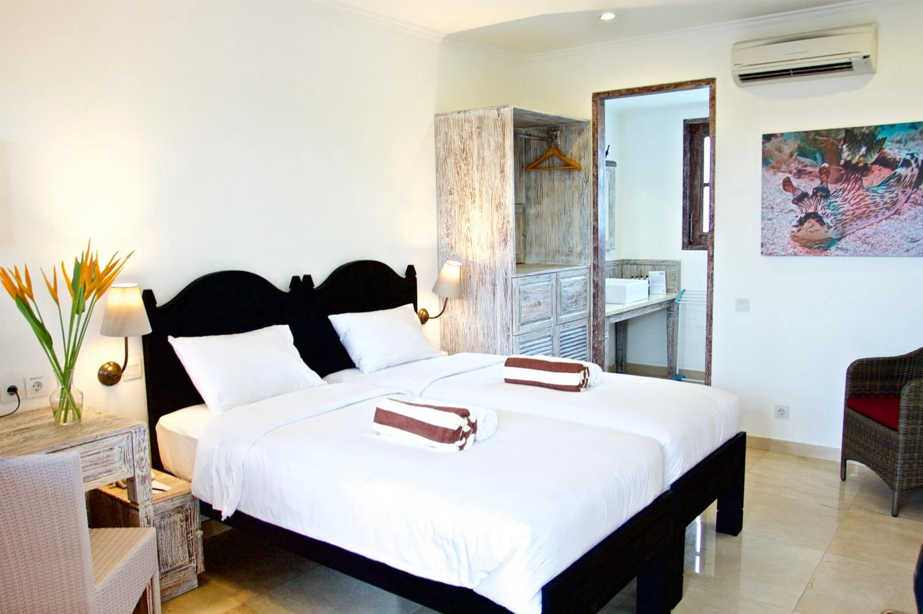 Bed in OK Divers Resort & Spa