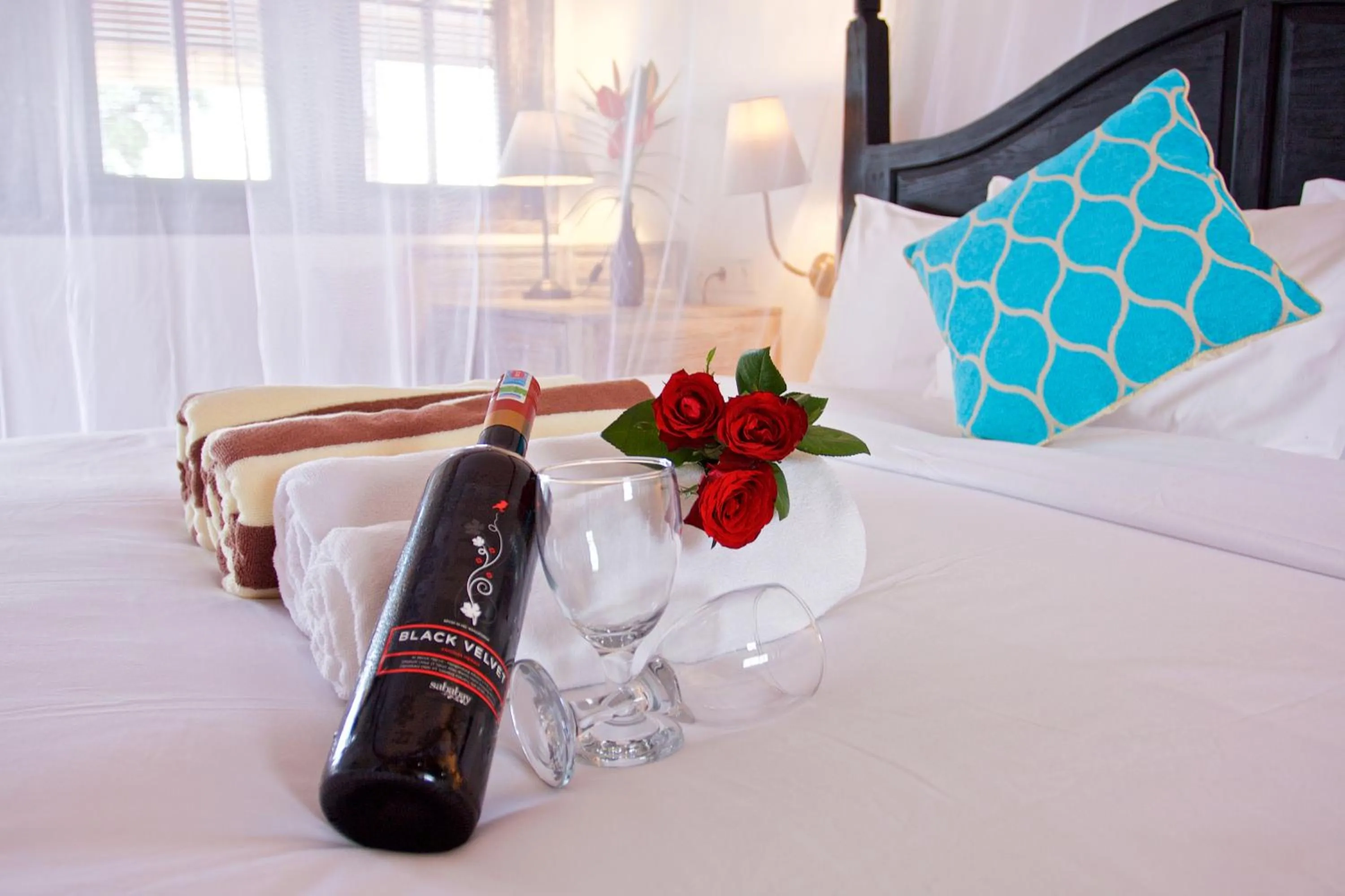 Bed in OK Divers Resort & Spa