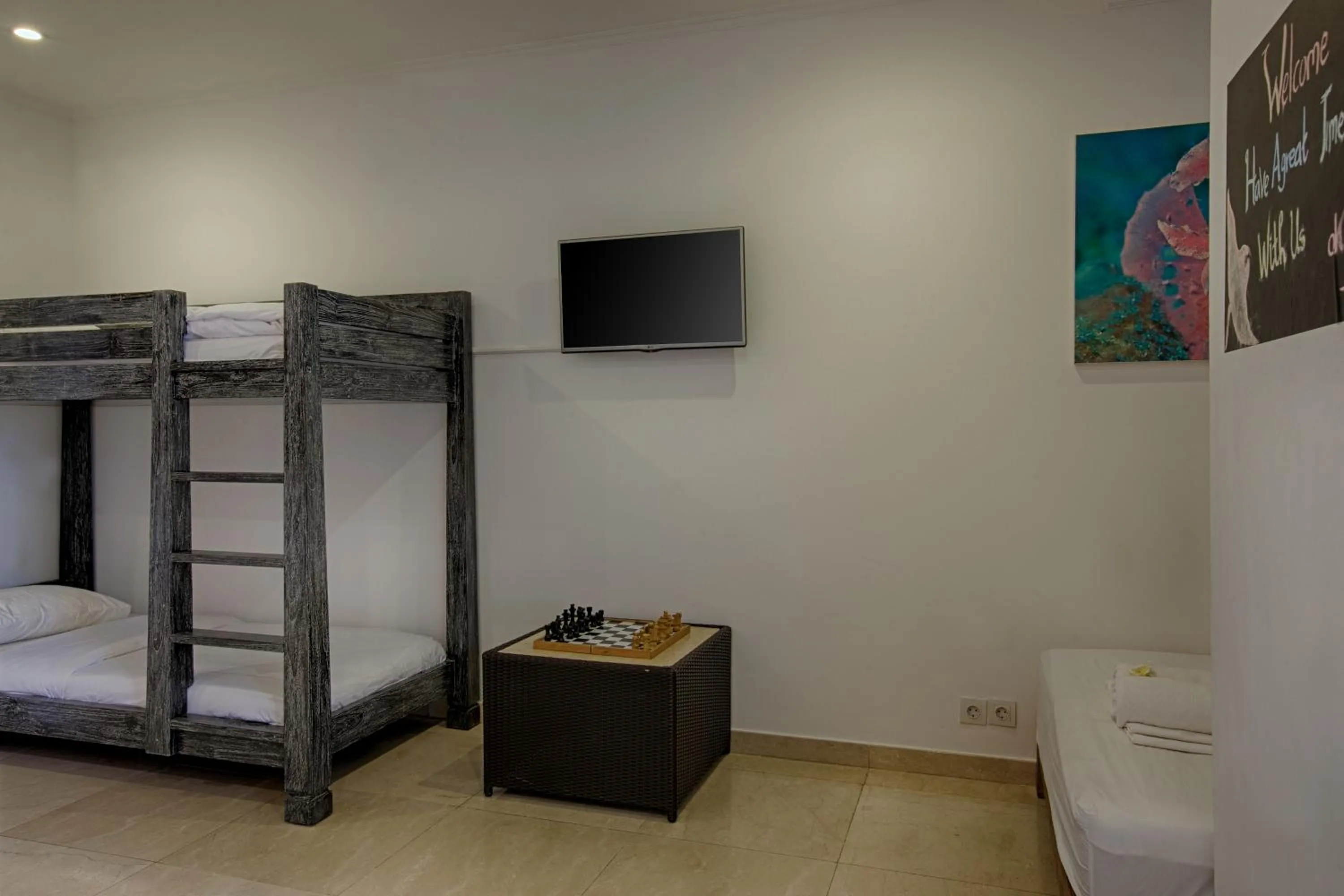 Bed in OK Divers Resort & Spa