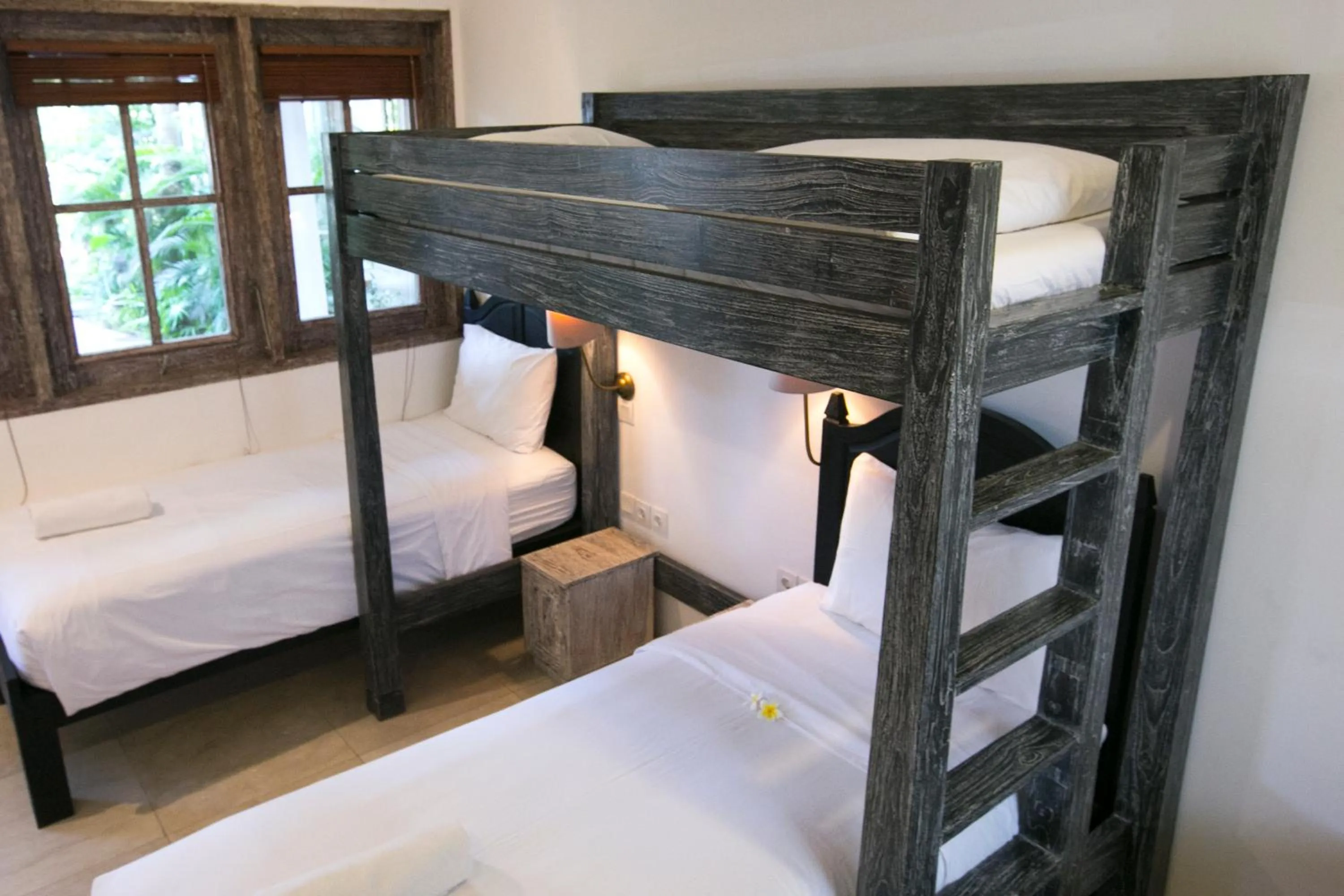 Bed in OK Divers Resort & Spa