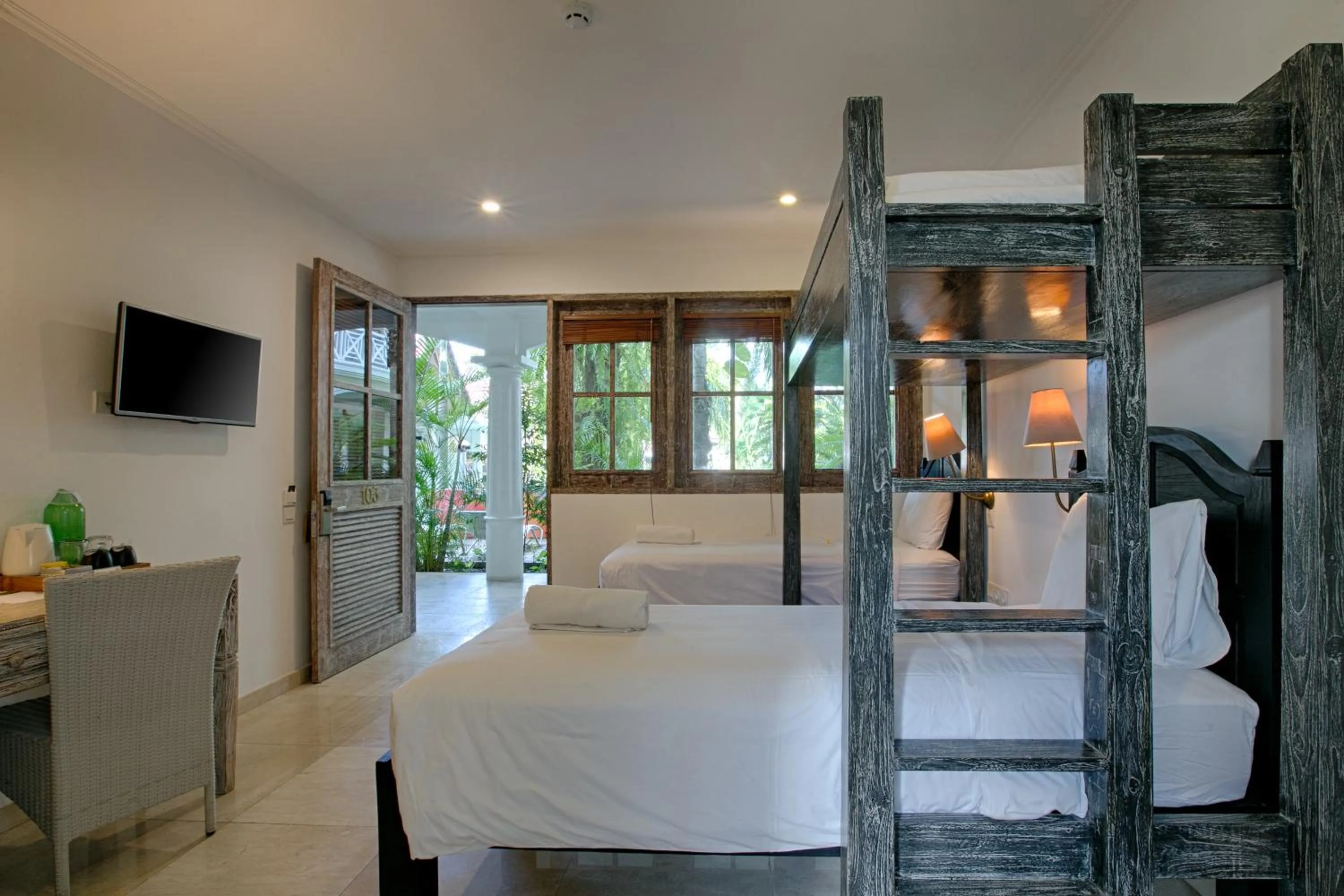 Bed in OK Divers Resort & Spa