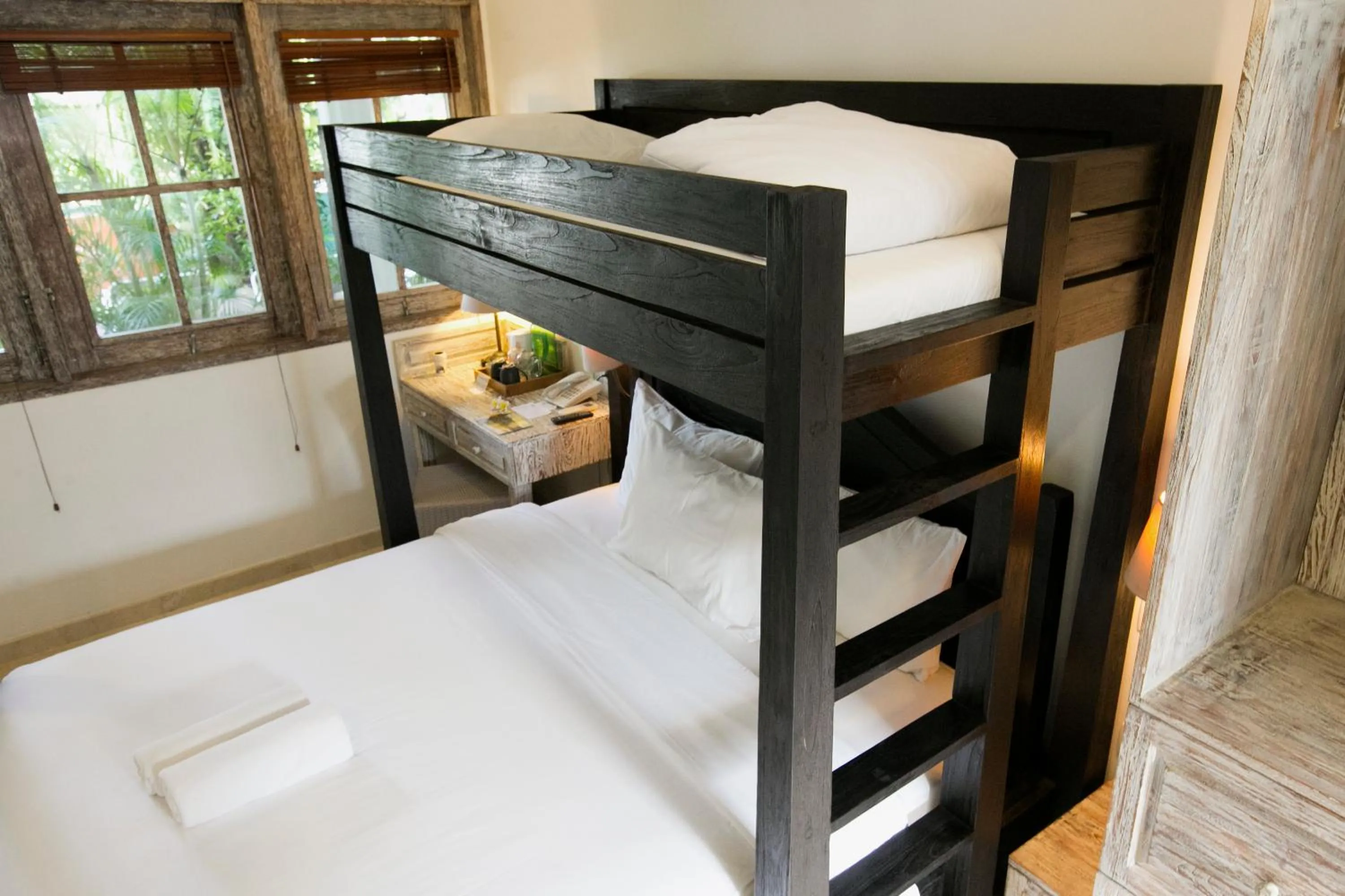 Bed in OK Divers Resort & Spa