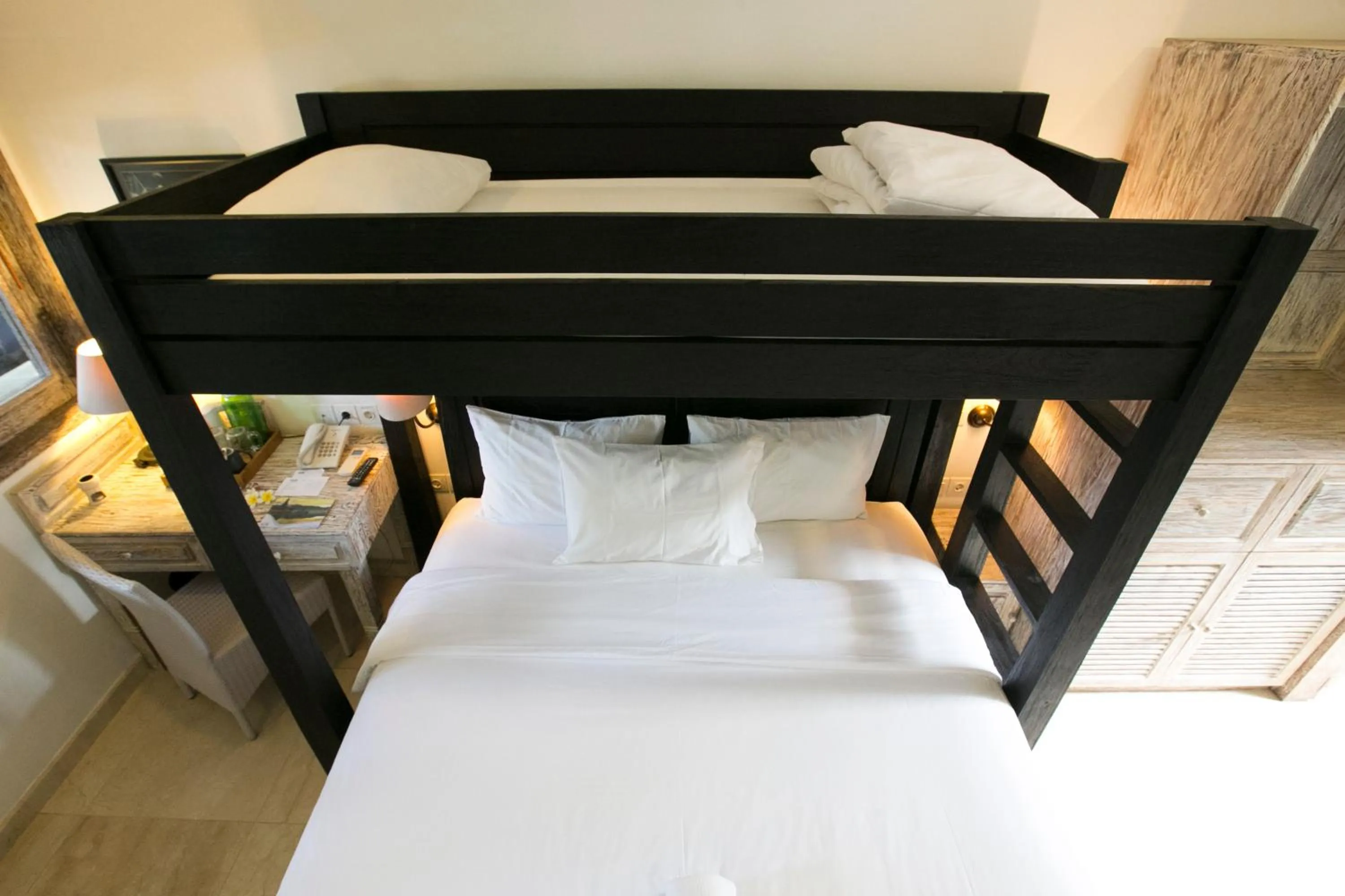 Bed in OK Divers Resort & Spa