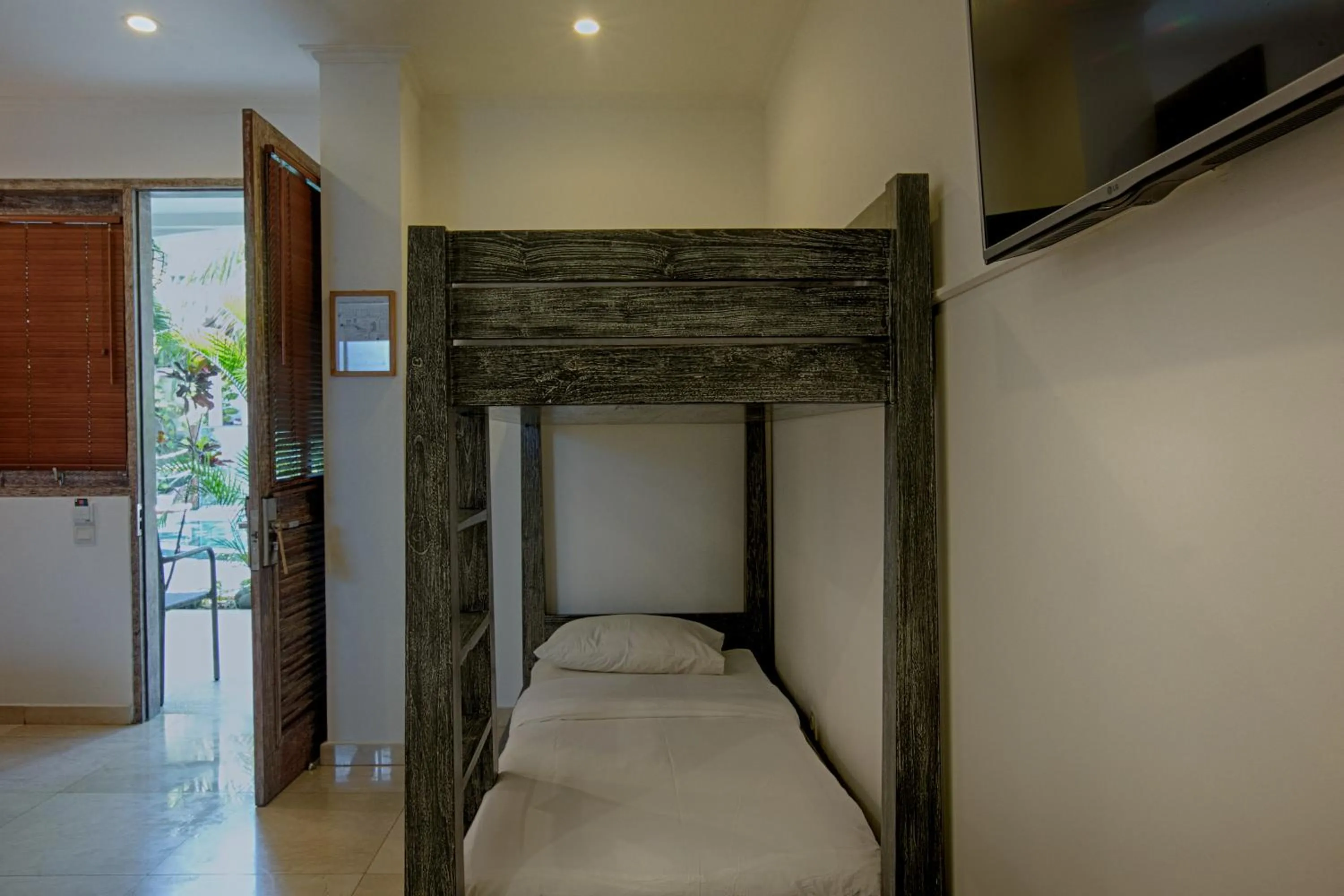 Bed in OK Divers Resort & Spa