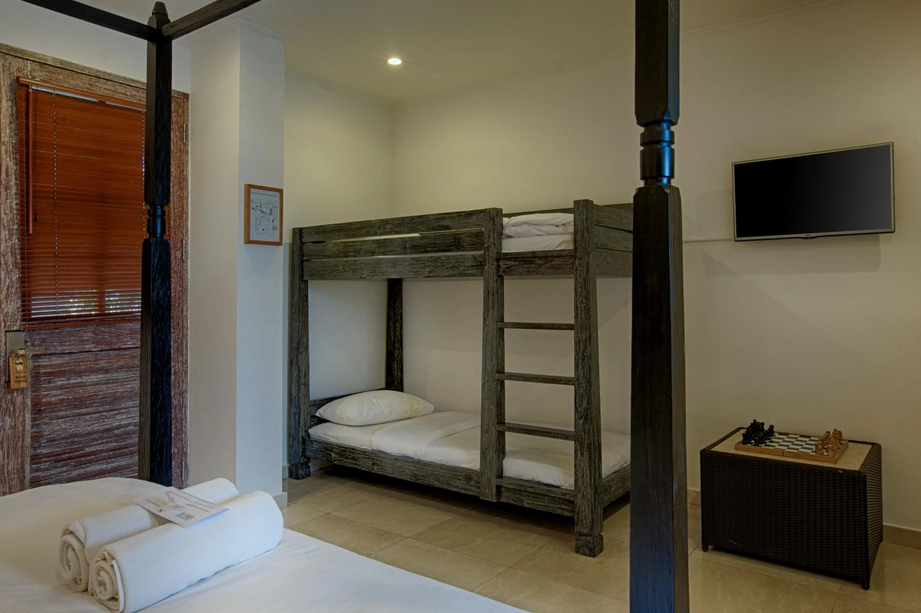 Bed in OK Divers Resort & Spa