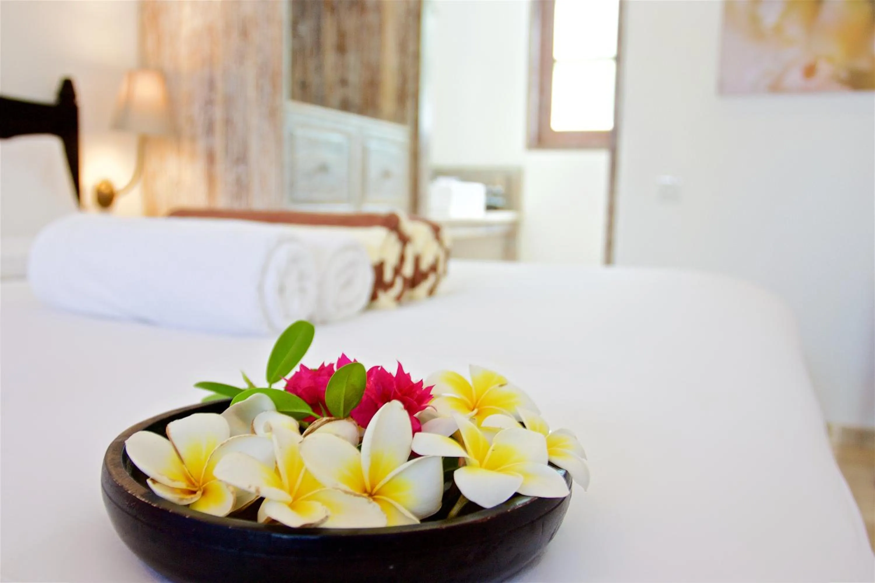 Bed in OK Divers Resort & Spa