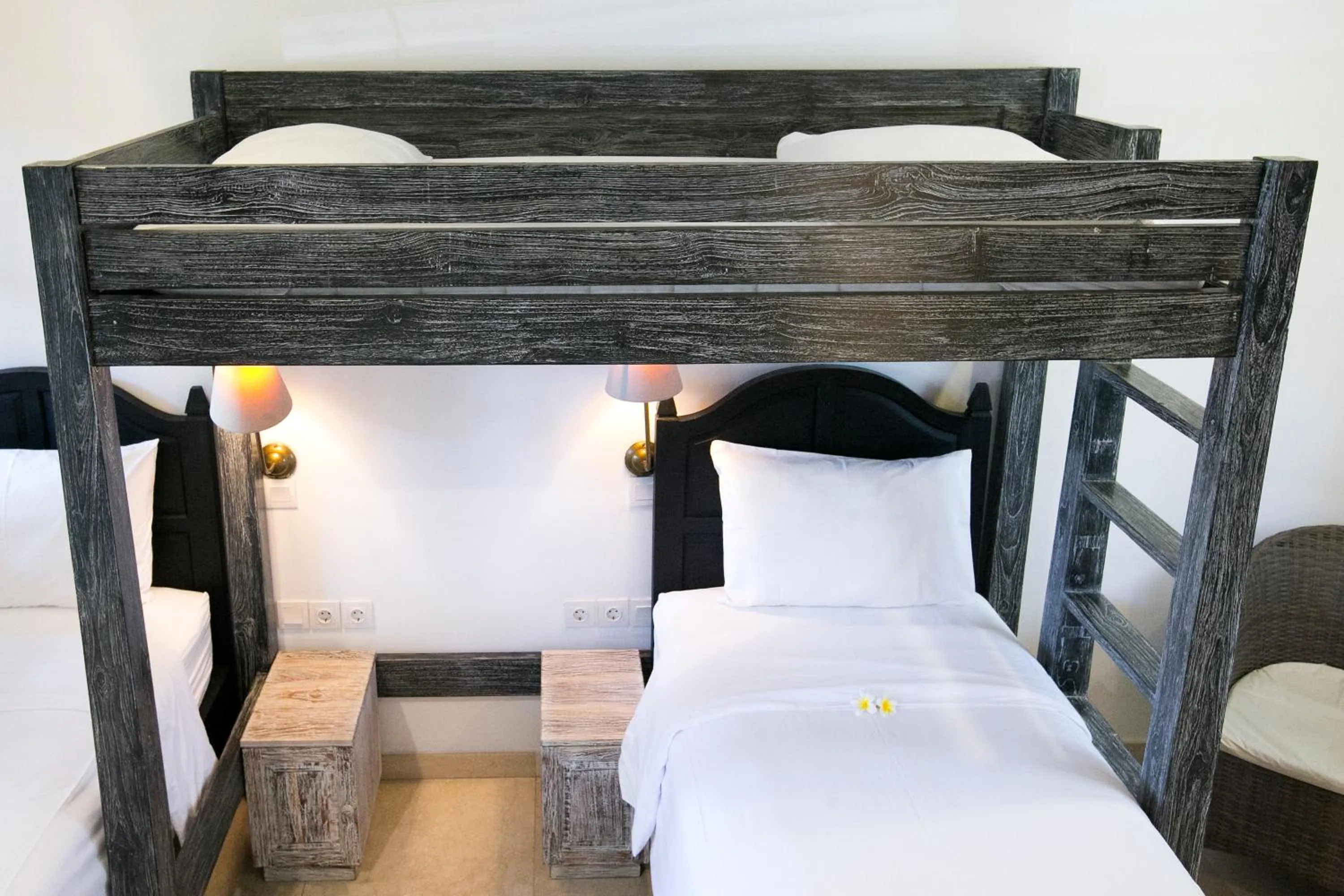 Bed in OK Divers Resort & Spa