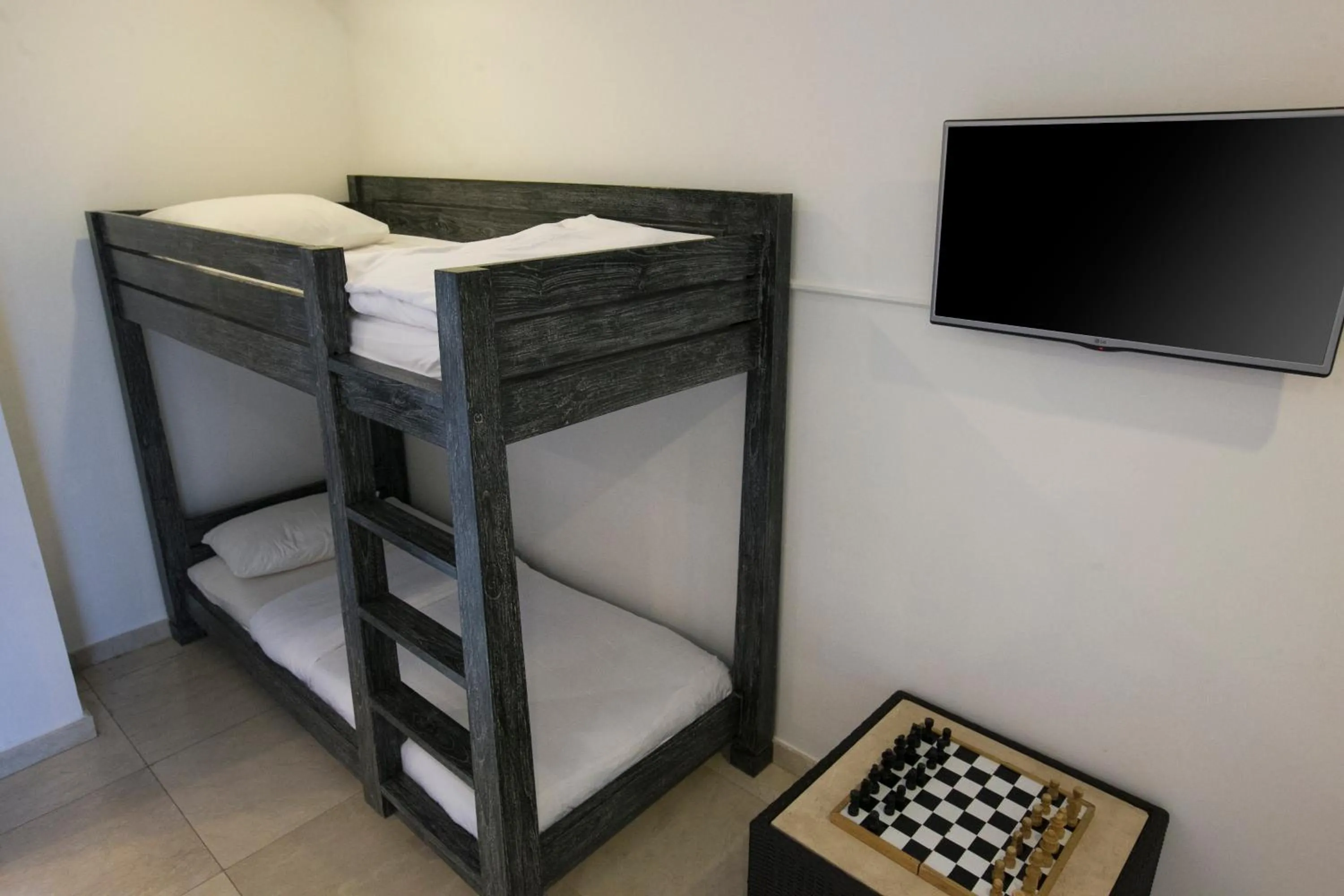 Bed in OK Divers Resort & Spa