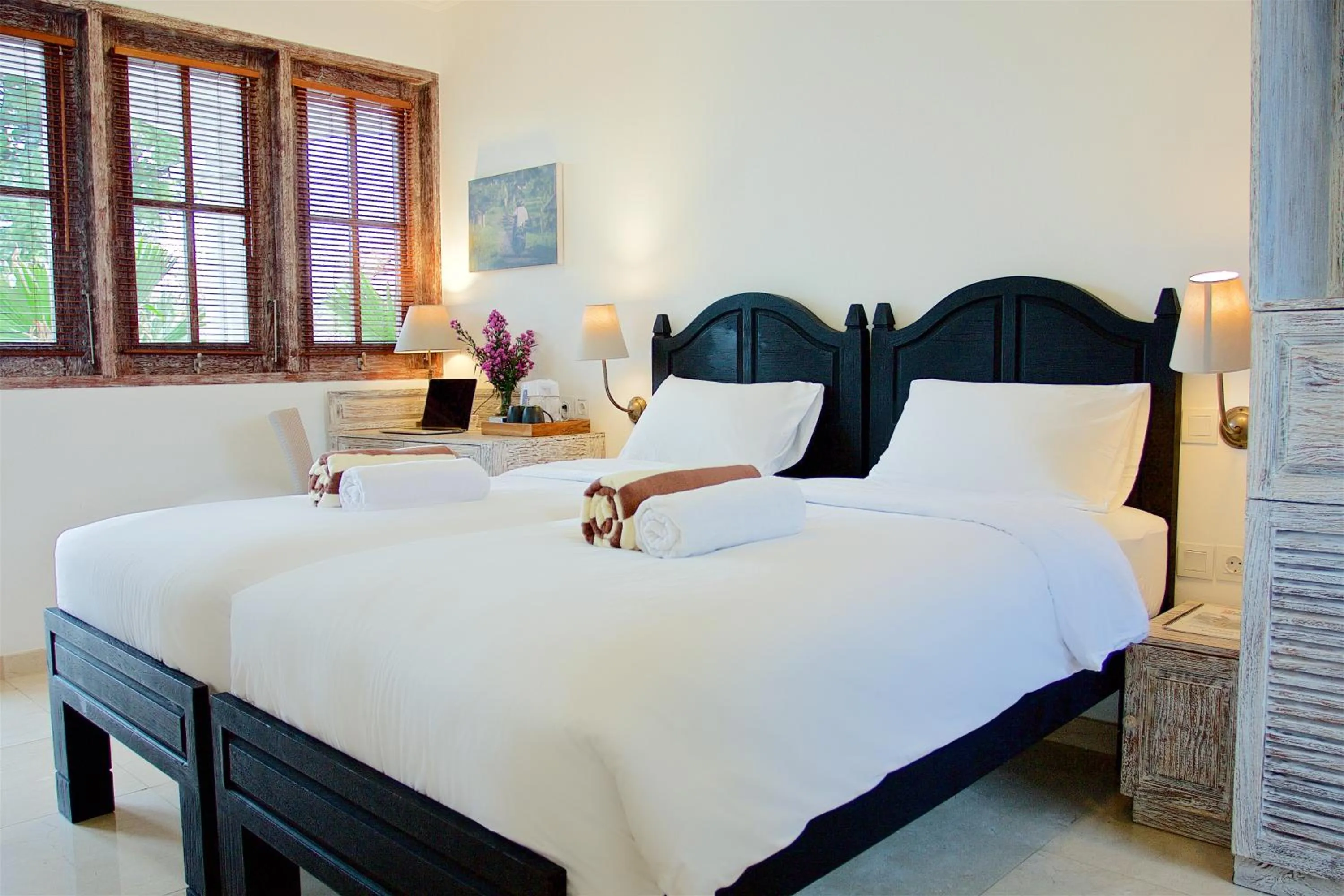 Bed in OK Divers Resort & Spa