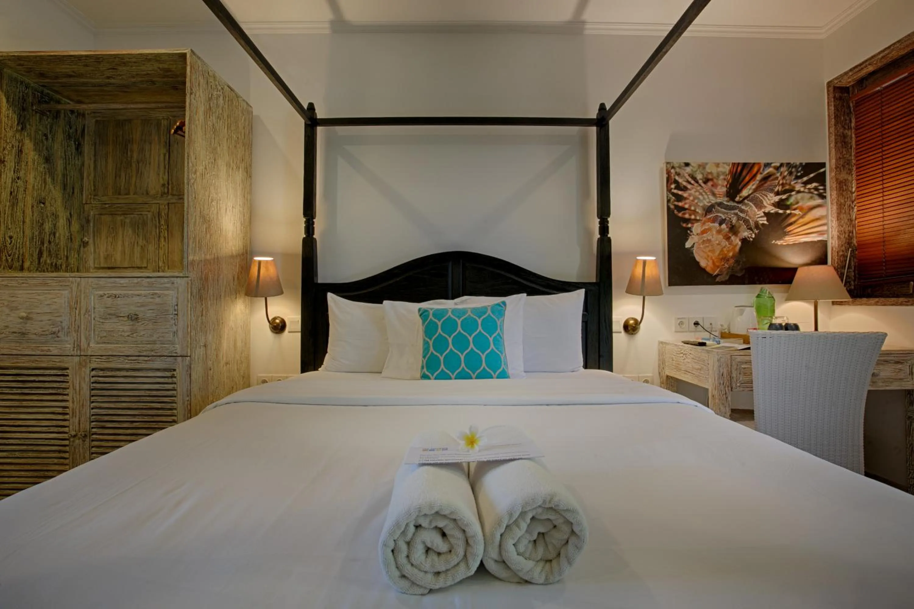 Bed in OK Divers Resort & Spa