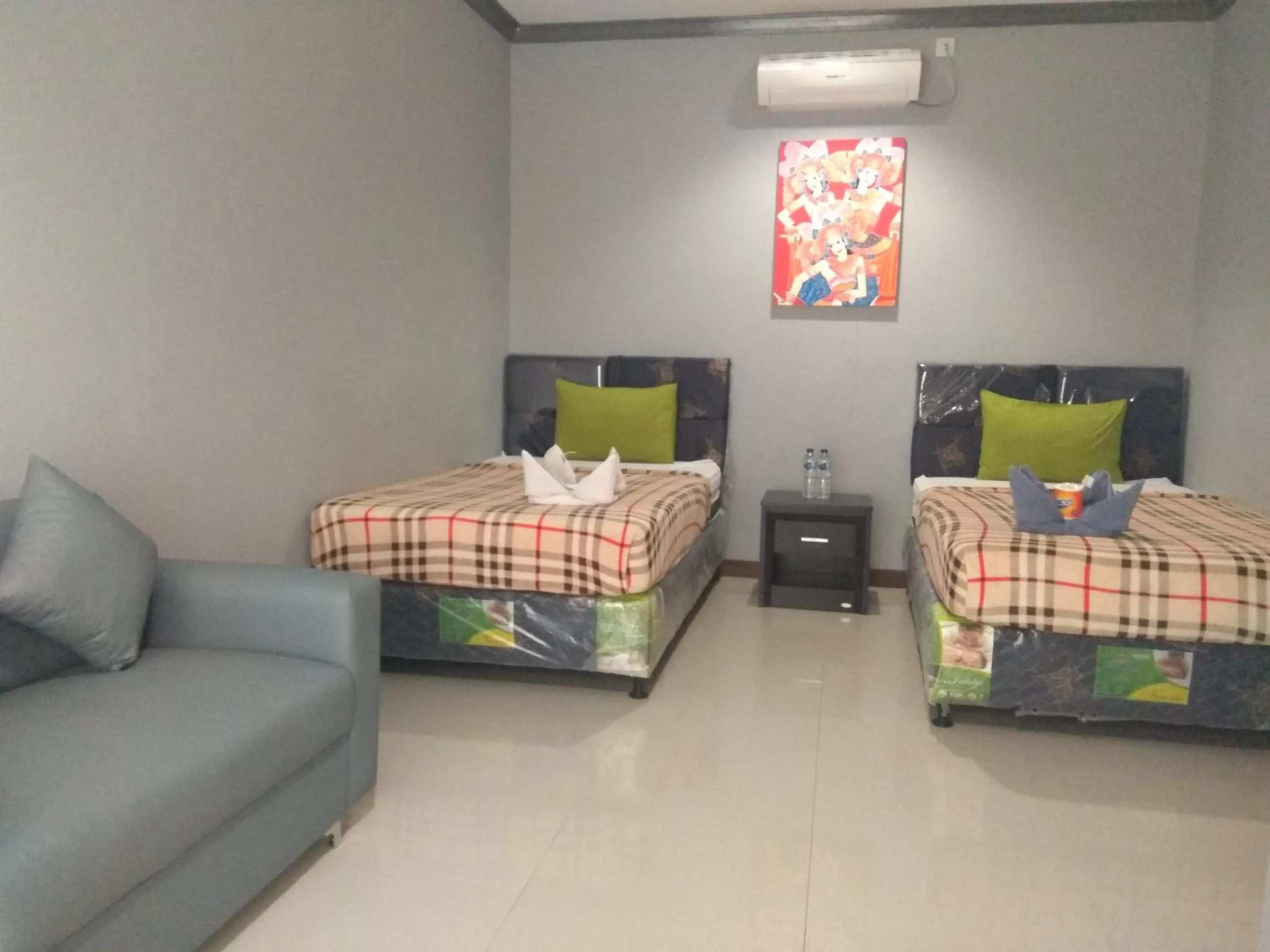 Bed in Tri Putri Homestay