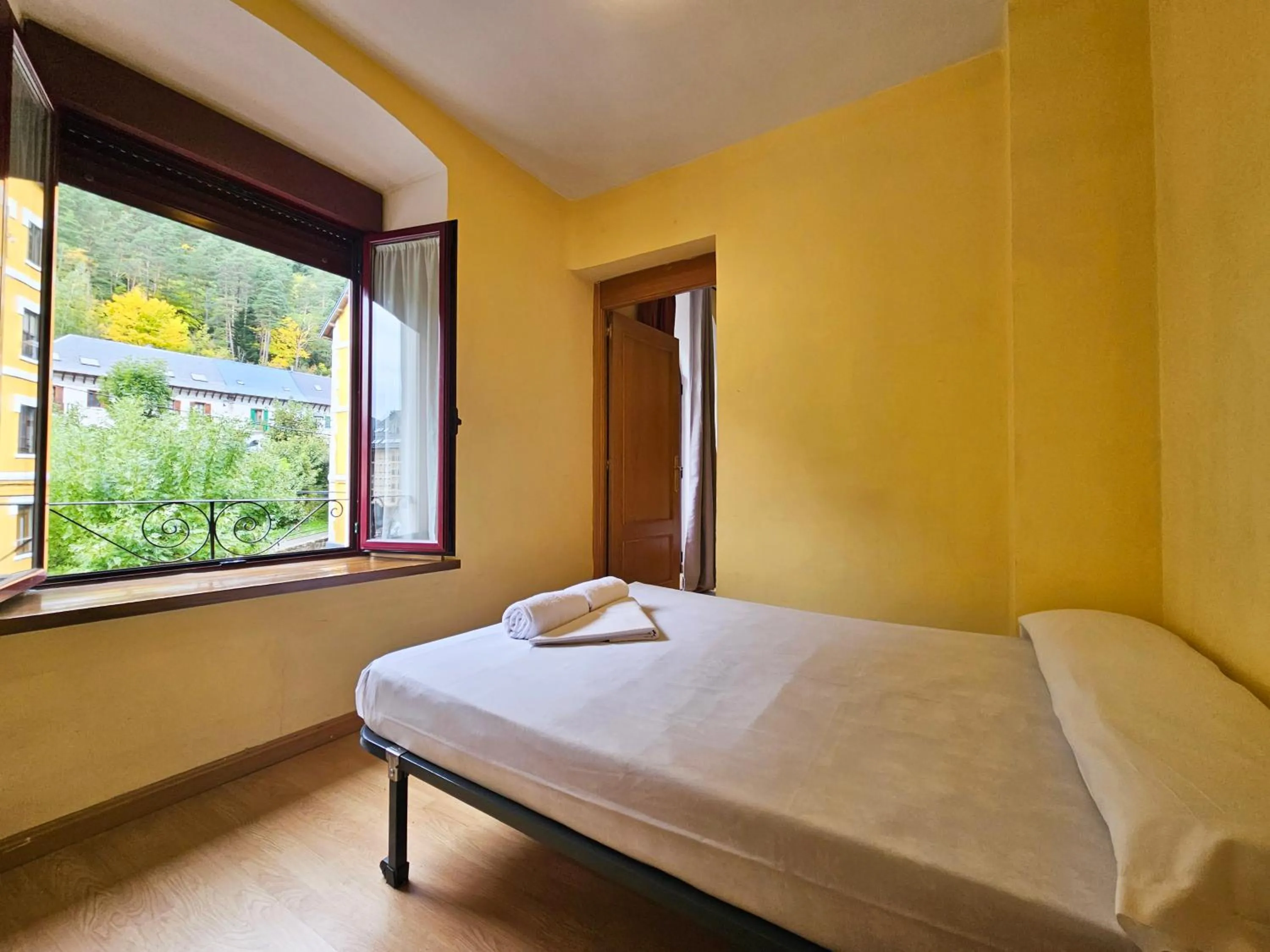 Bed in Apartamentos Canfranc 3000