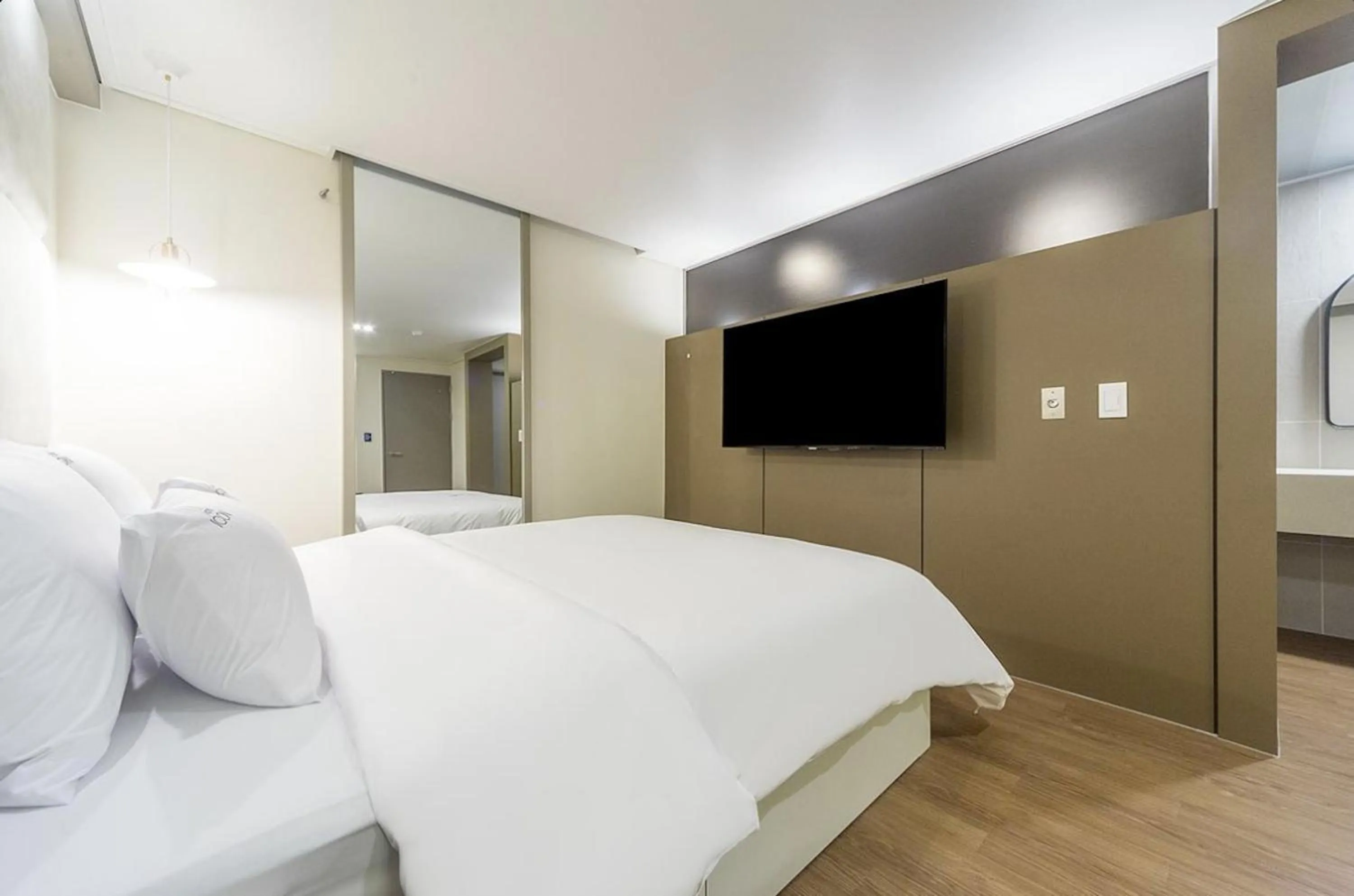 Bed in Icon Hotel Gunsan