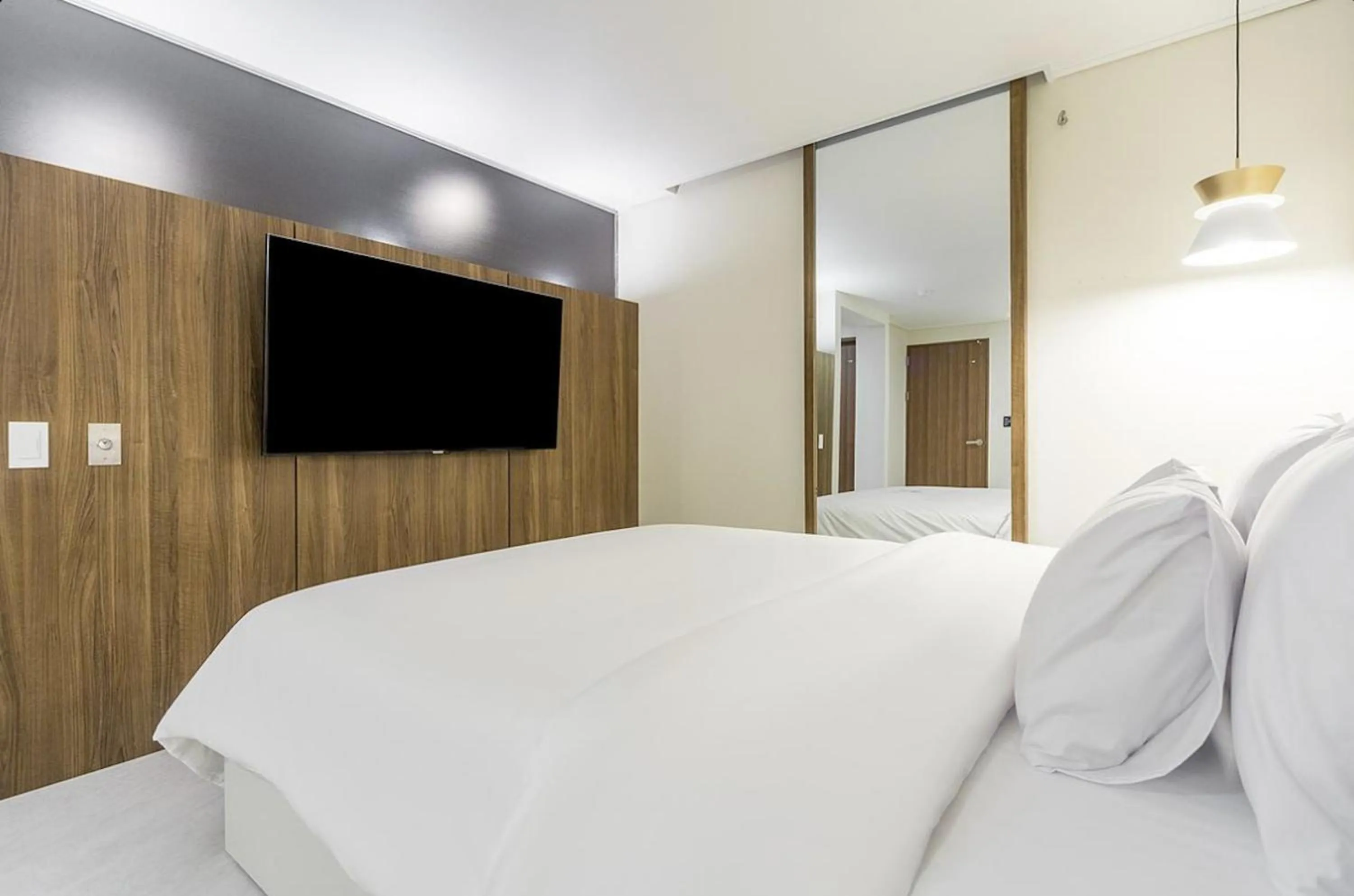 Bed in Icon Hotel Gunsan