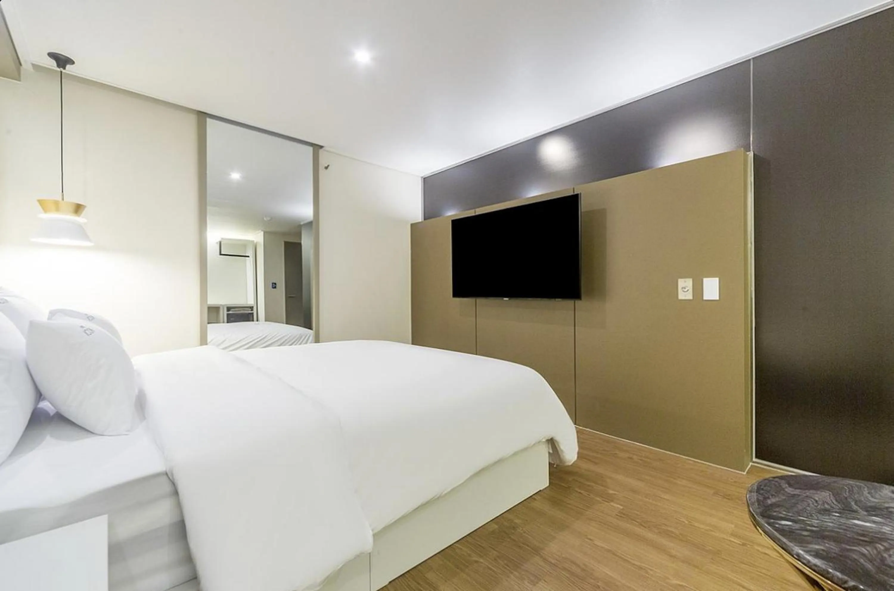 Bed in Icon Hotel Gunsan