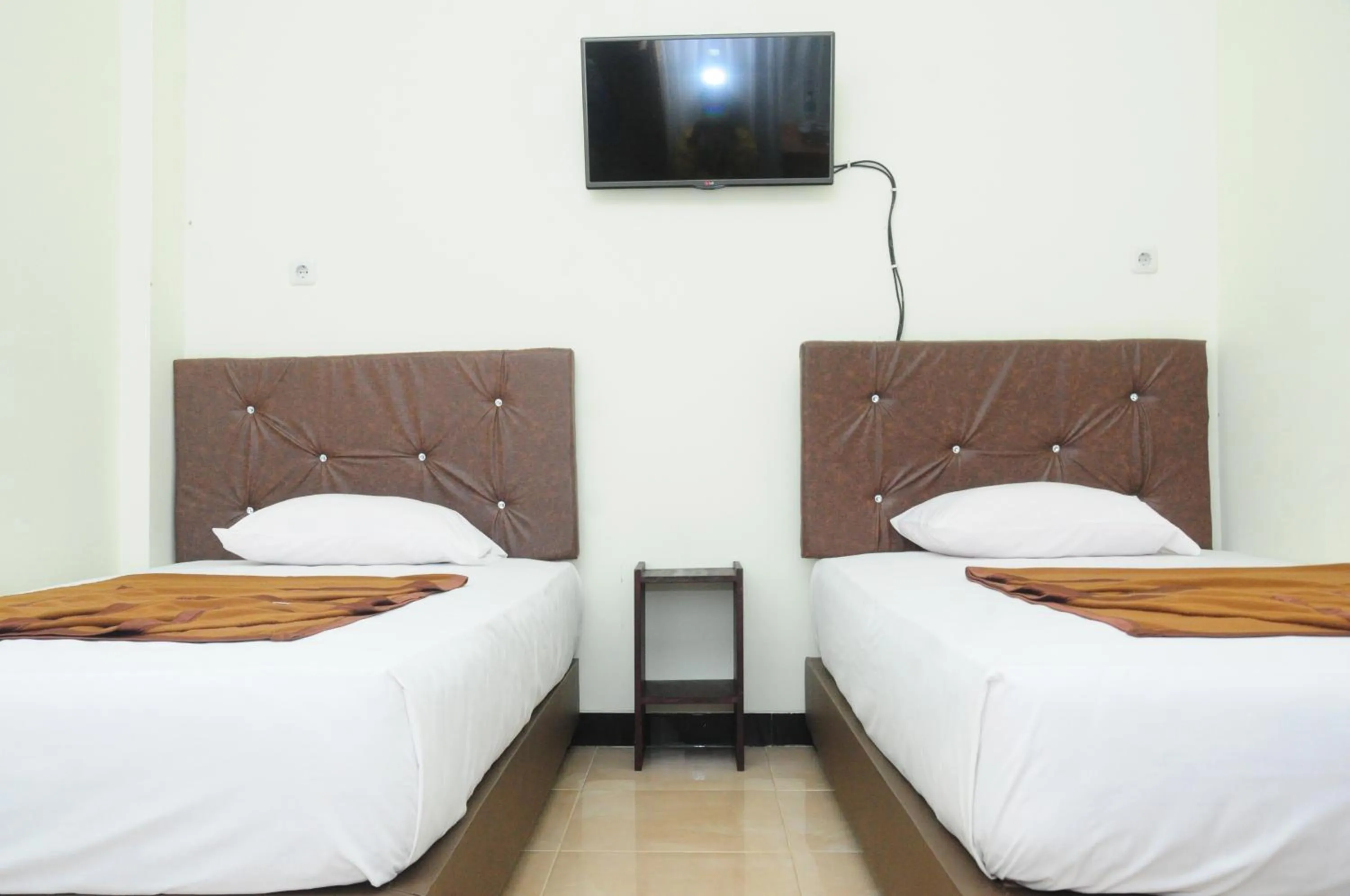 Bed in Dena Hotel