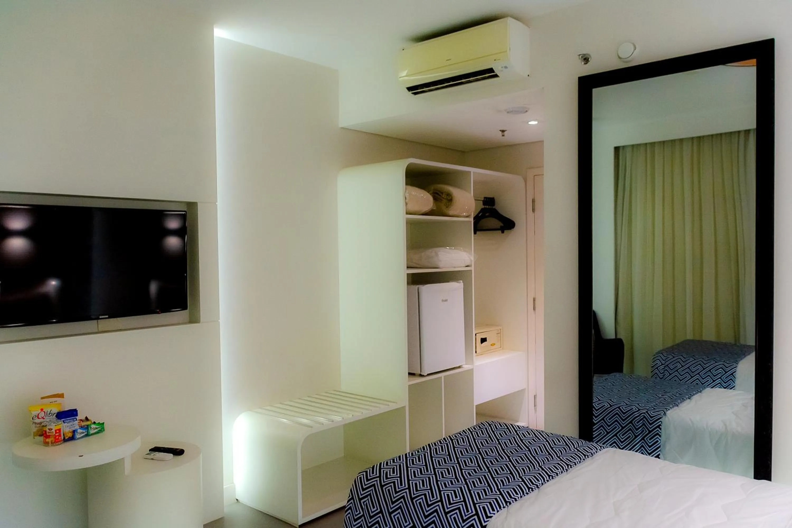 Bed in Golden Tower Shopping by Fênix Hotéis