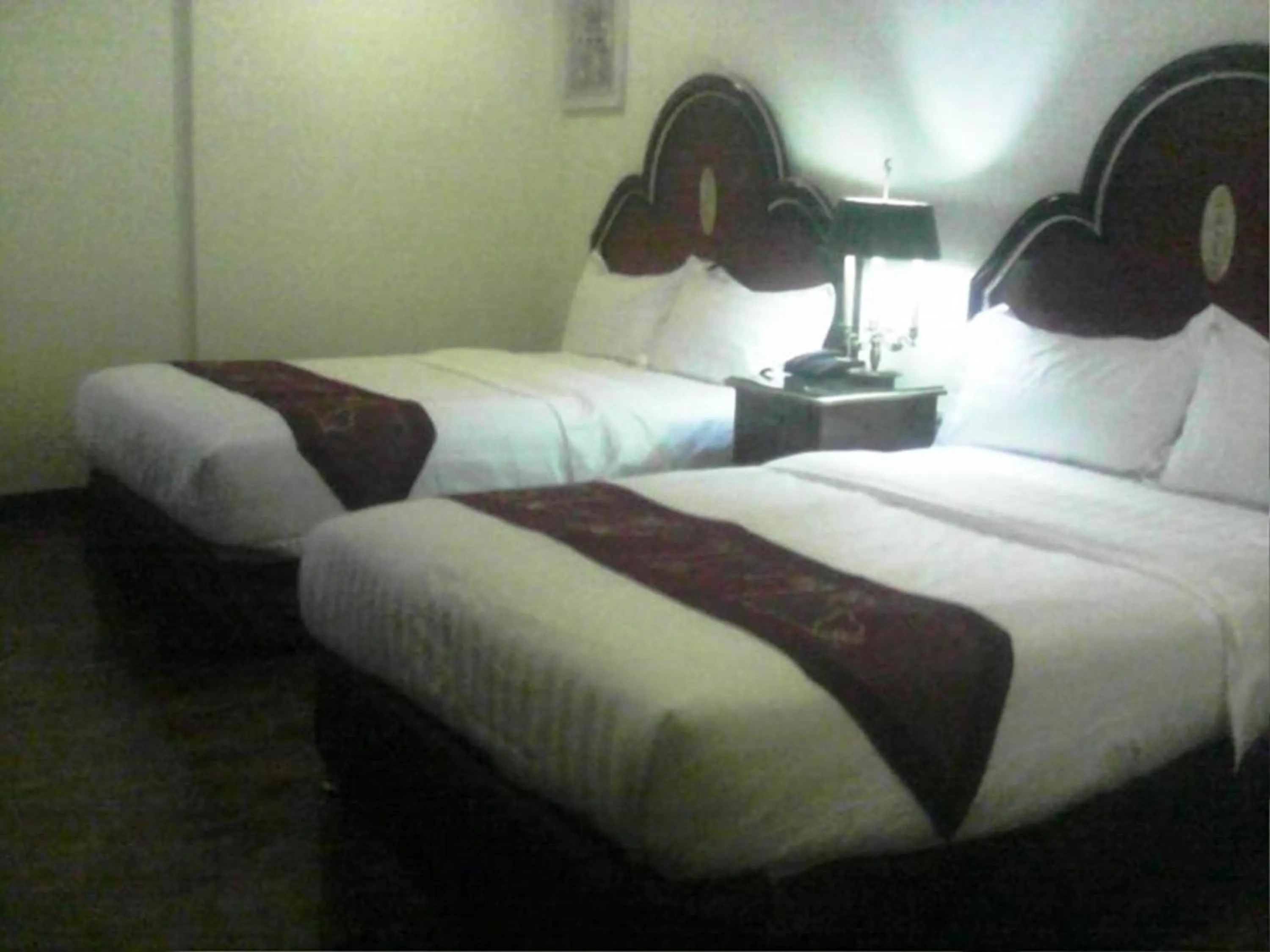 Bed in Rainbowland Hotel