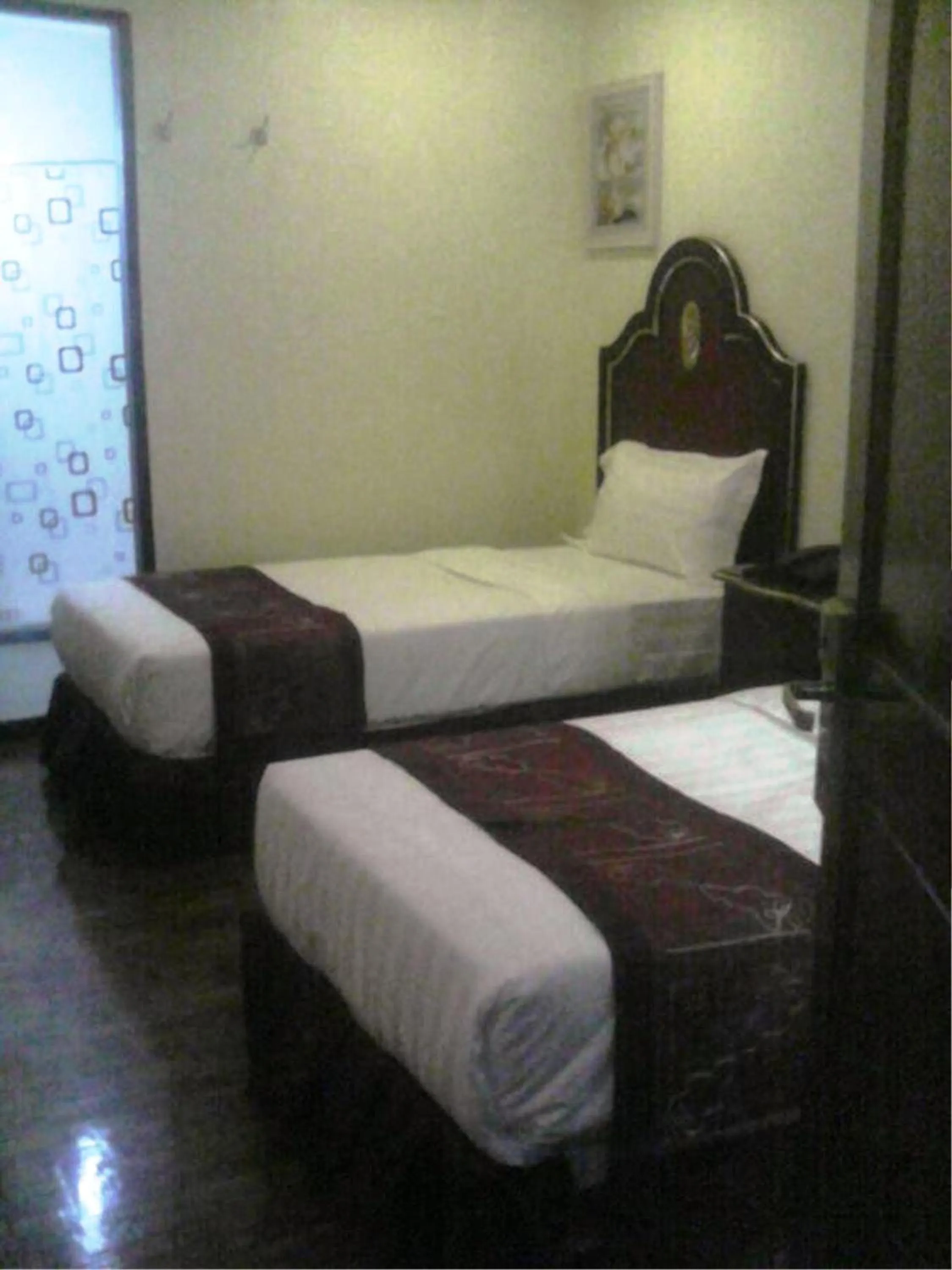 Photo of the whole room, Bed in Rainbowland Hotel